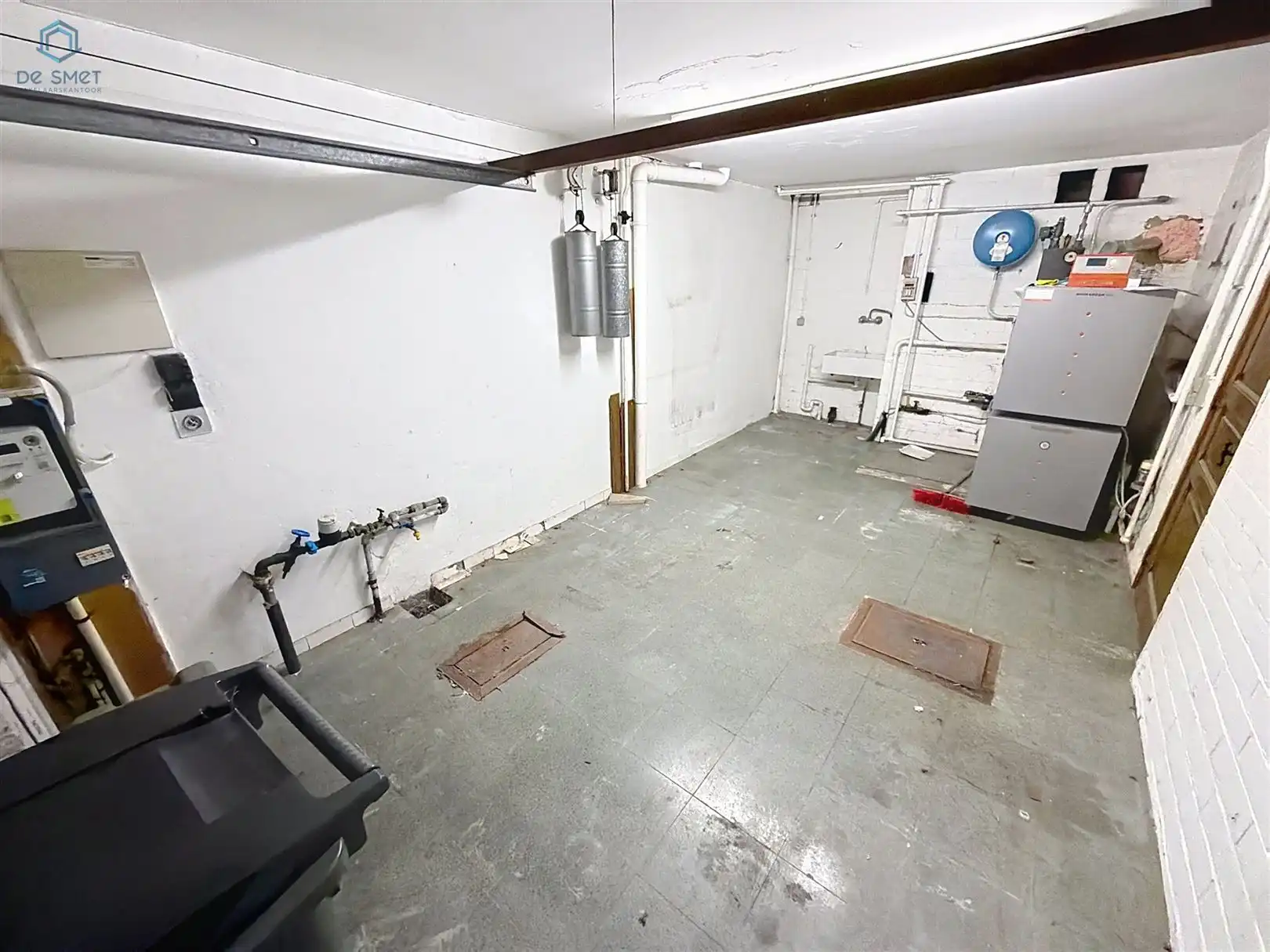 Te renoveren woning met 4 slaapkamers, garage en tuin op toplocatie in Denderleeuw foto 11