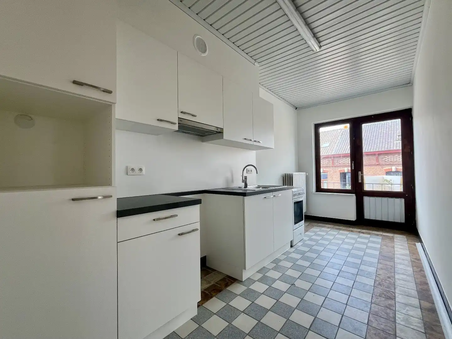 Betaalbaar appartement met twee slaapkamers, kelder en standplaats in hartje Bilzen foto 10