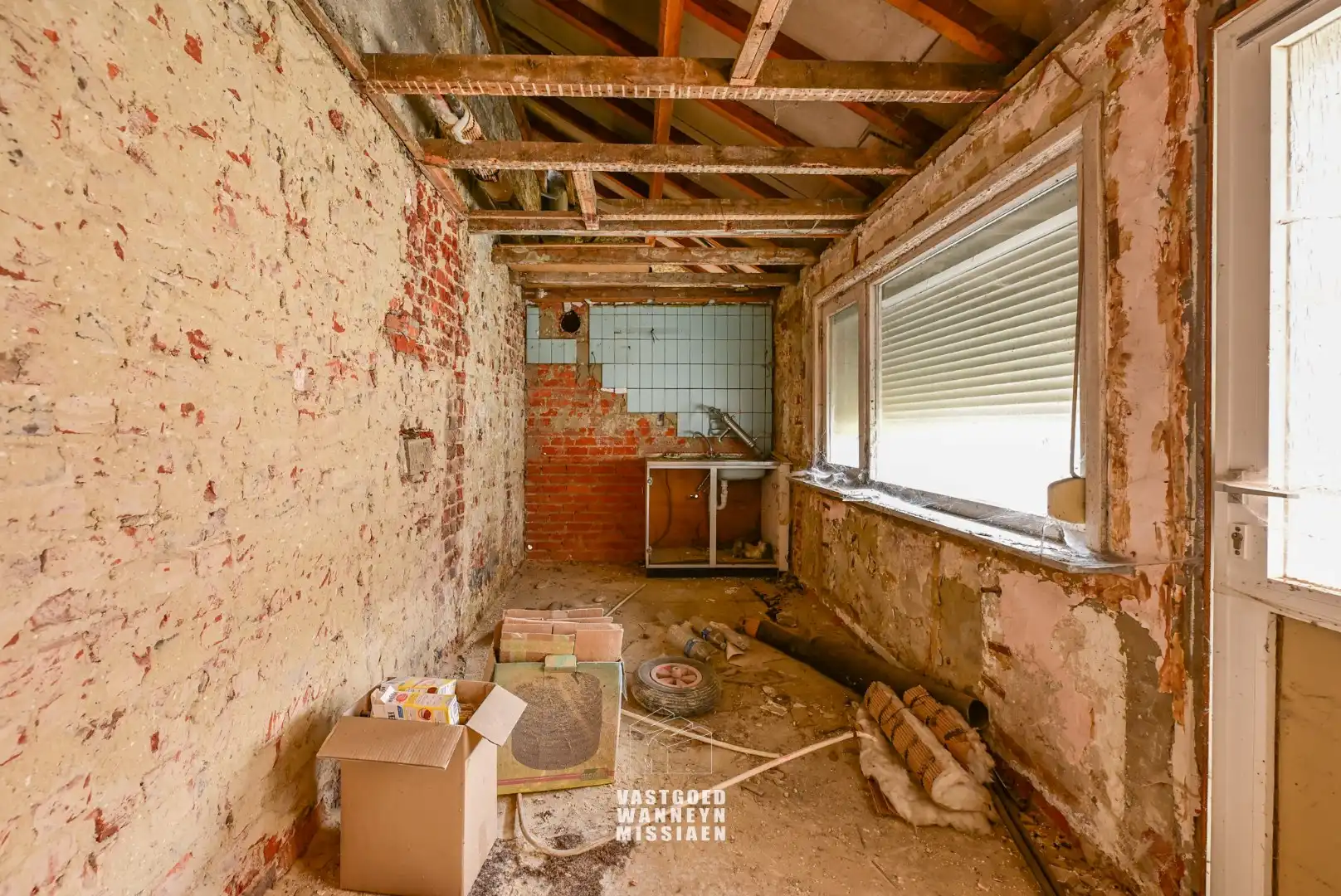 Bouwgrond met af te breken woning op 1100m2 te Zwevezele foto 9