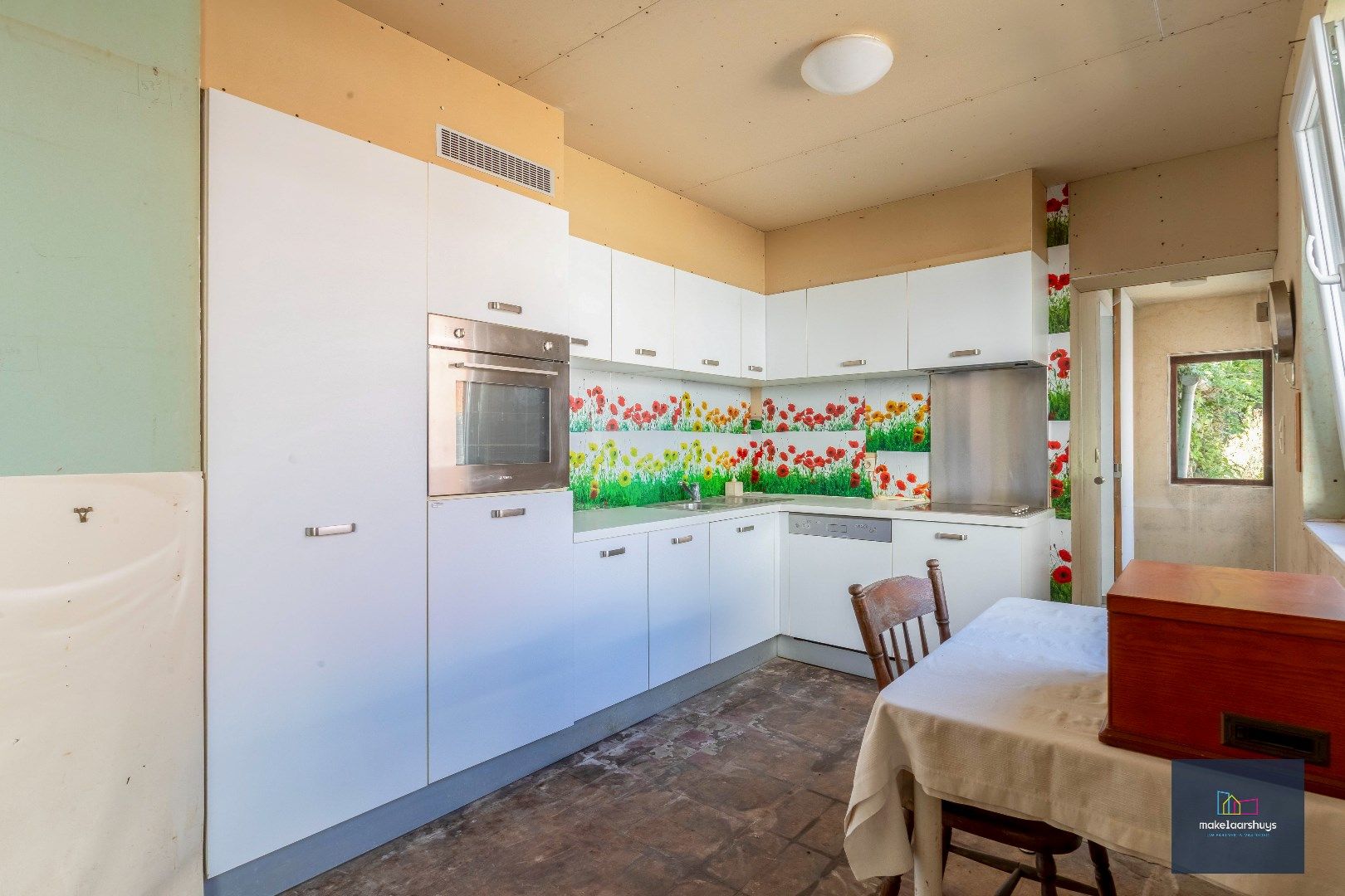 Residentieel gelegen  te renoveren halfopen bebouwing met tuin  foto 12