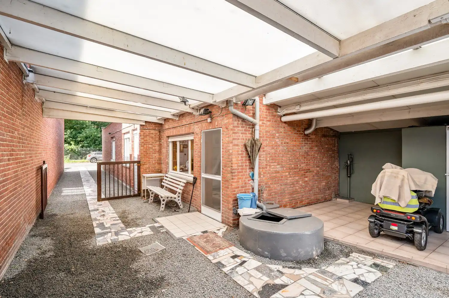 Te renoveren laagbouwwoning met garage, atelier en tuin op een perceel van 451 m². foto 26
