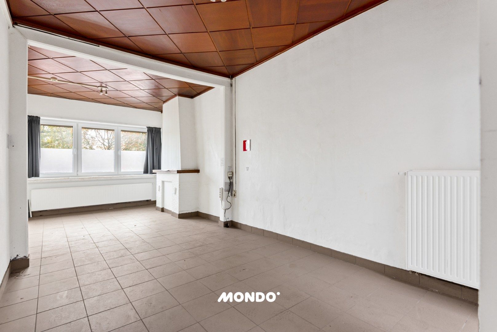 Rustig gelegen woning met 3 slaapkamers en veel potentieel nabij het centrum! foto 6