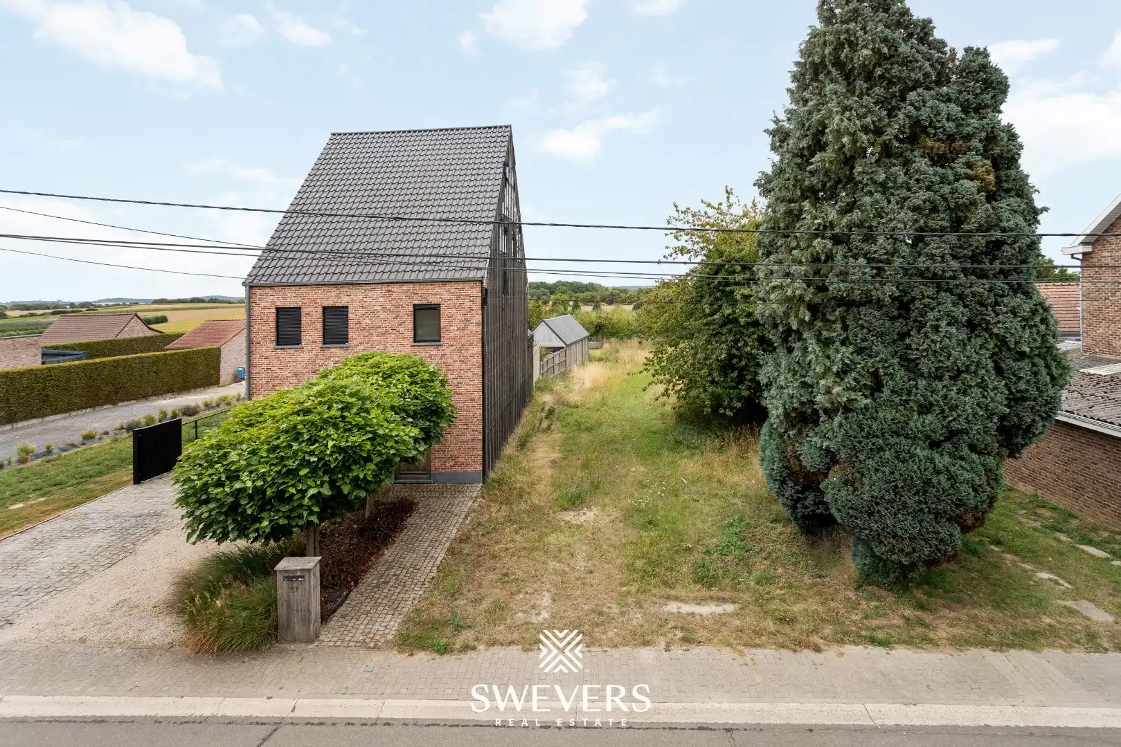 Bouwgrond met open zicht & bouwvergunning in Sint-Truiden foto {{pictureIndex}}