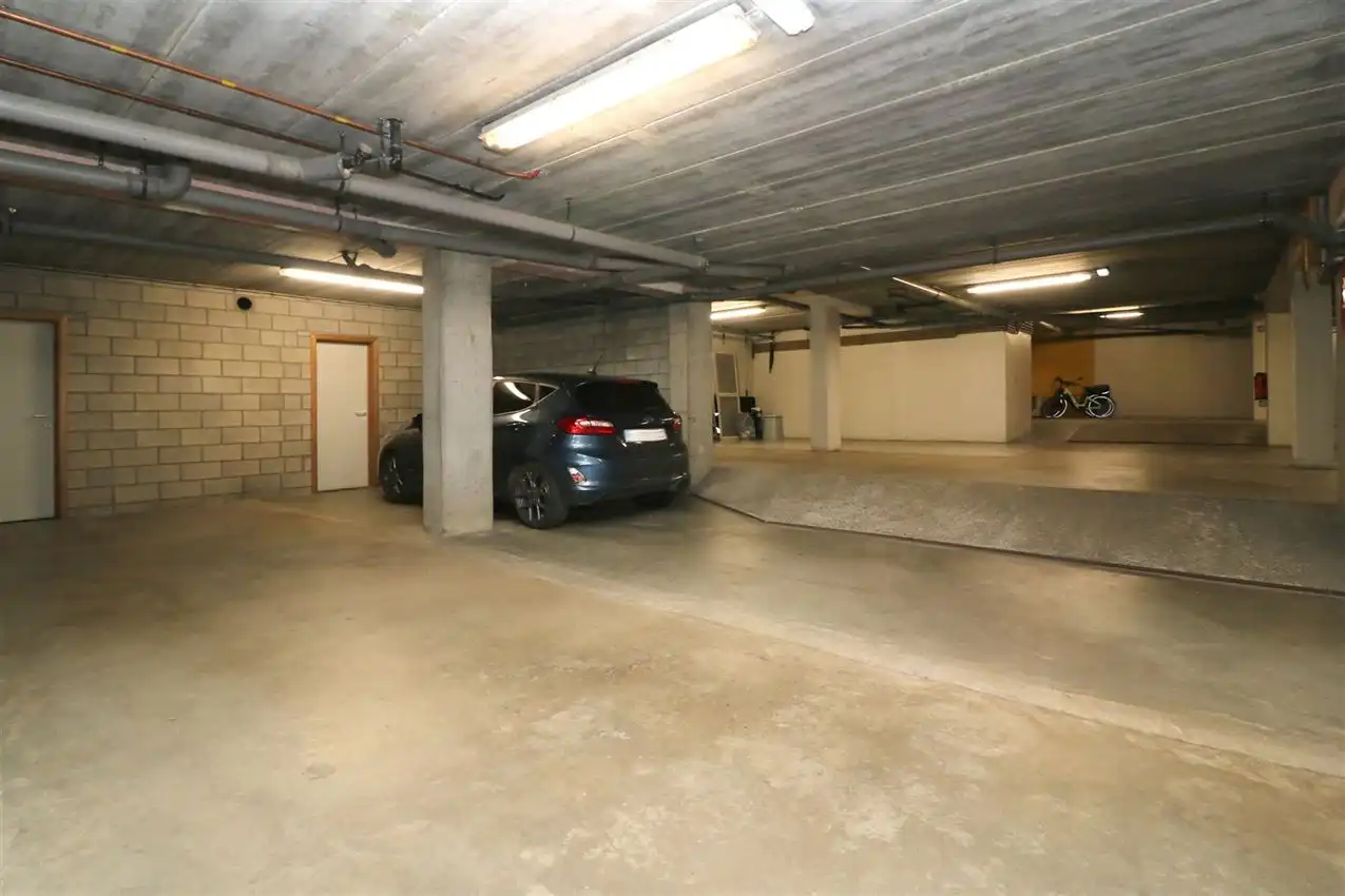 Gelijkvloers wonen met tuintje en autostaanplaats in centrum foto 6