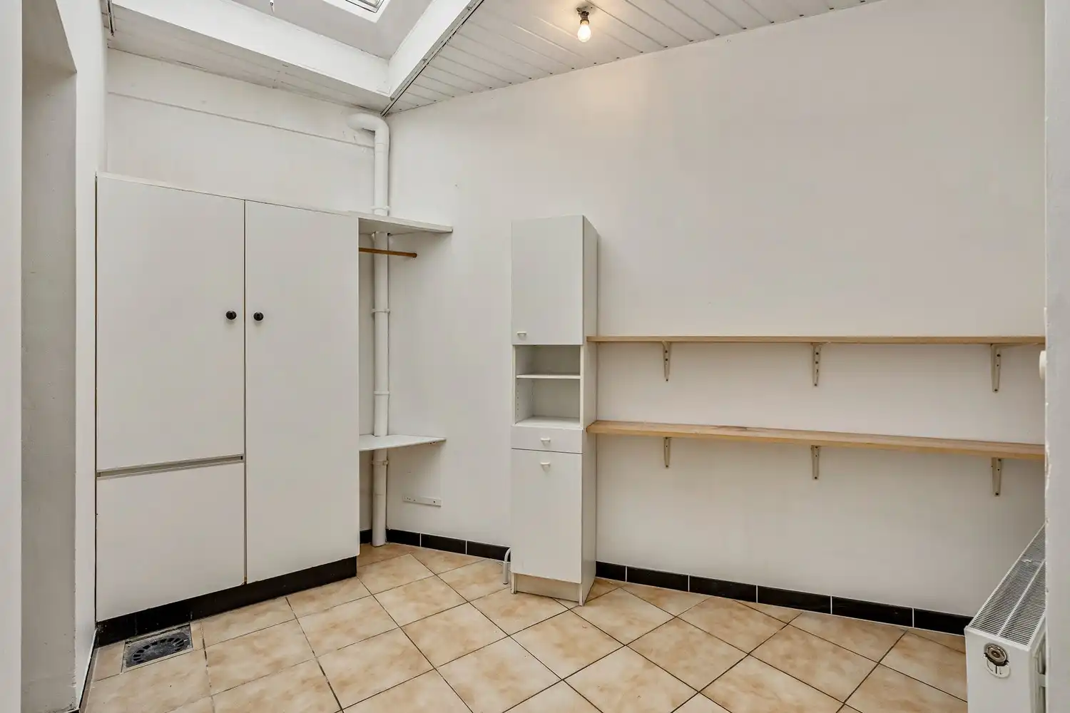 Goed gelegen rijwoning met 2 slaapkamers en een af te werken zolderruimte te Leuven! foto 6