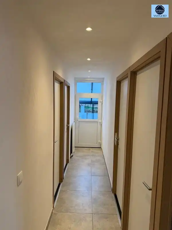 WONING MET HANDELSRUIMTE EN 3 SLAAPKAMERS foto 7