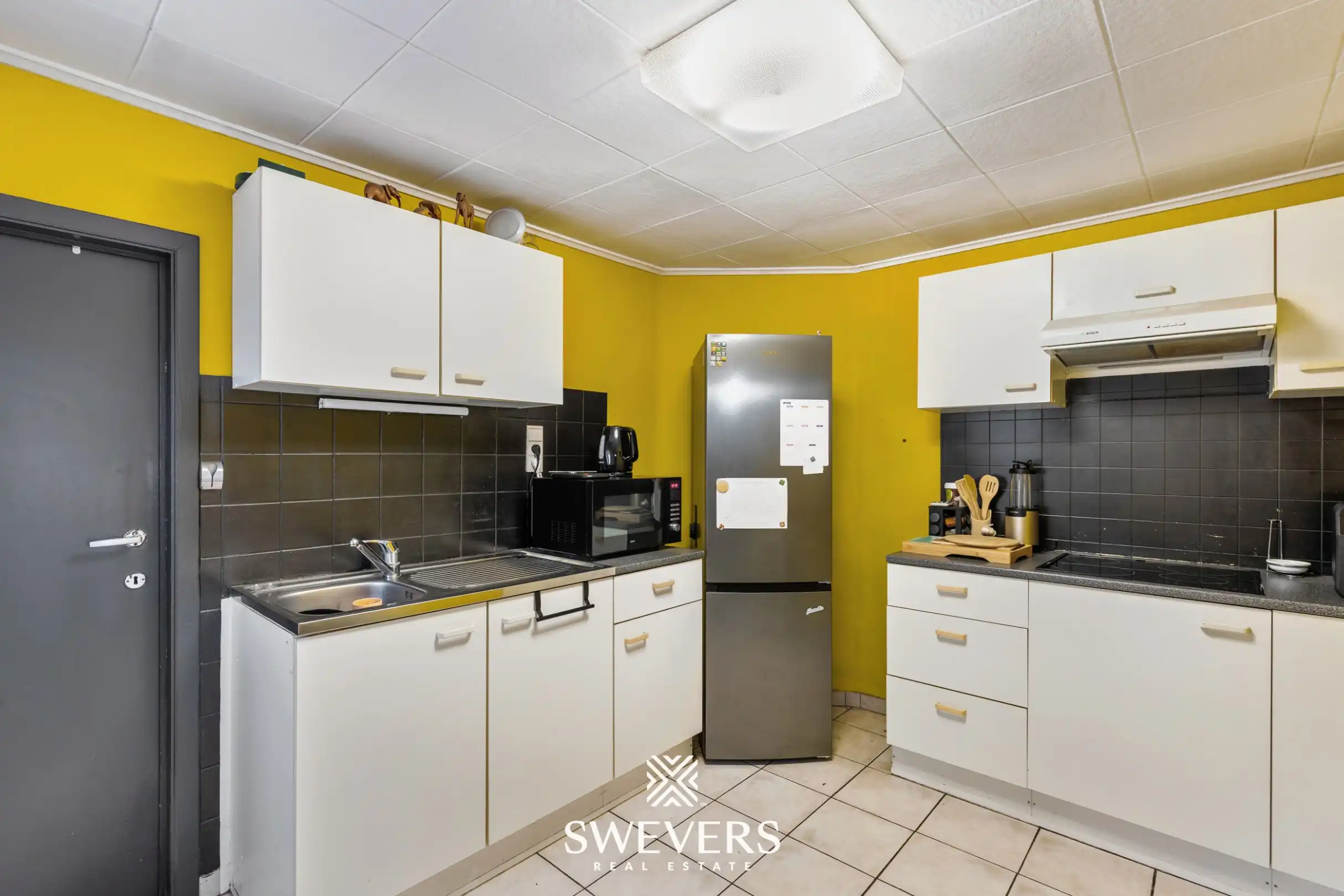 Charmante open bebouwing met renovatiepotentieel op toplocatie nabij centrum Heusden-Zolder foto 12