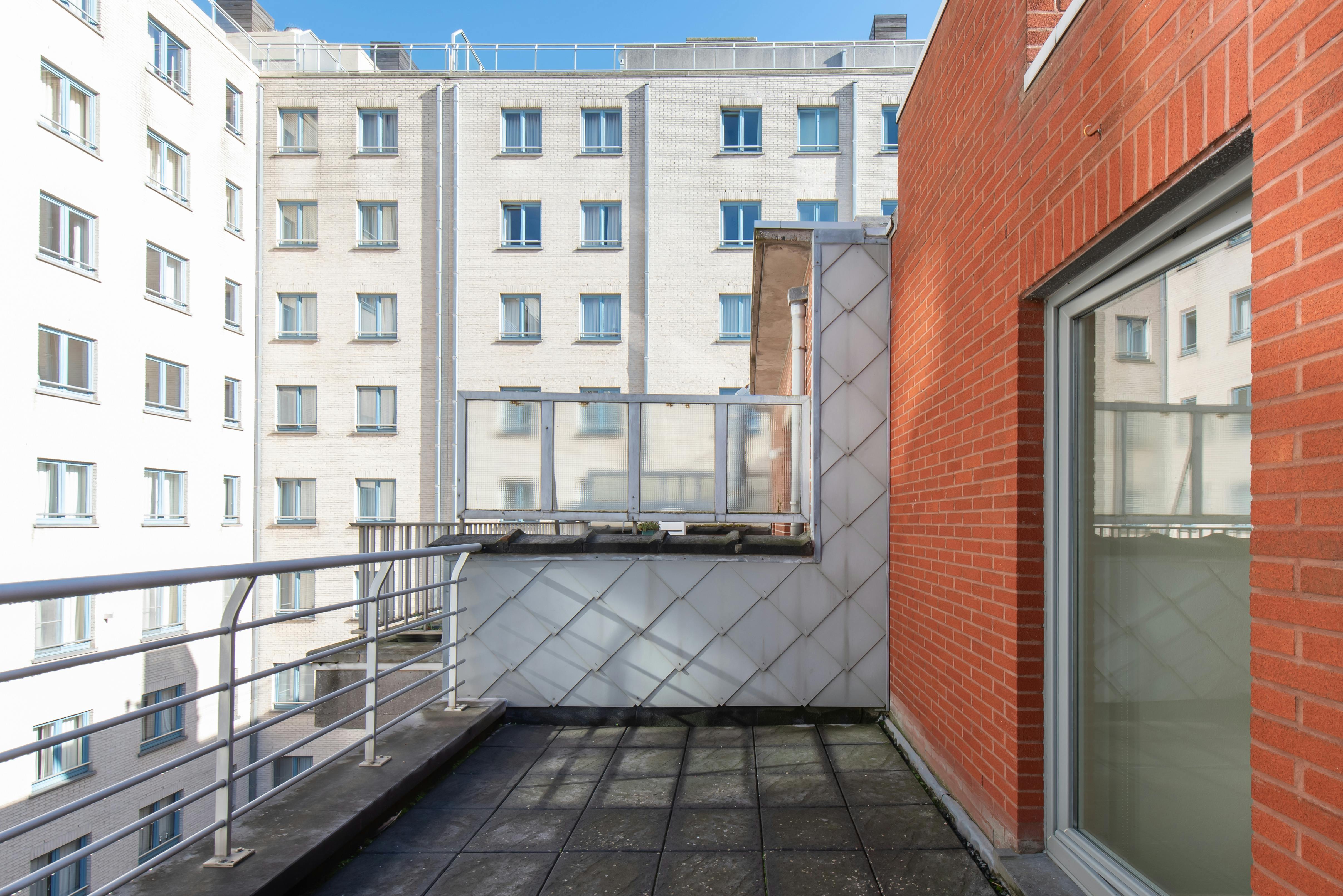 Zuidgerichte penthouse studio met ruime terrassen op topligging! foto 15