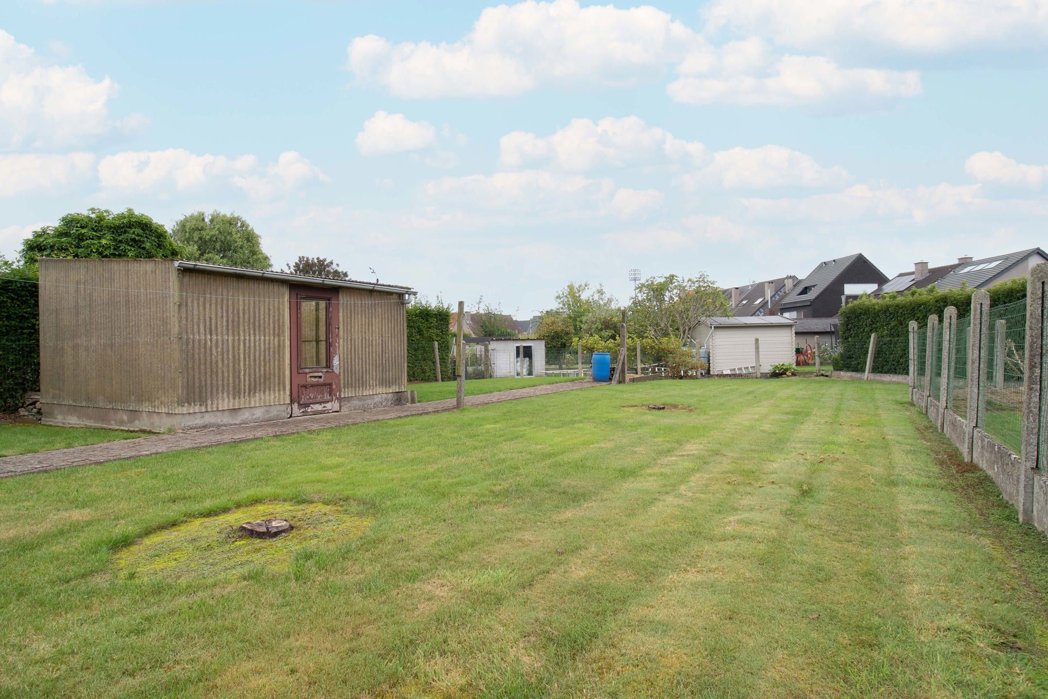 Charmante 3-gevelwoning met ruime tuin en garage foto 23