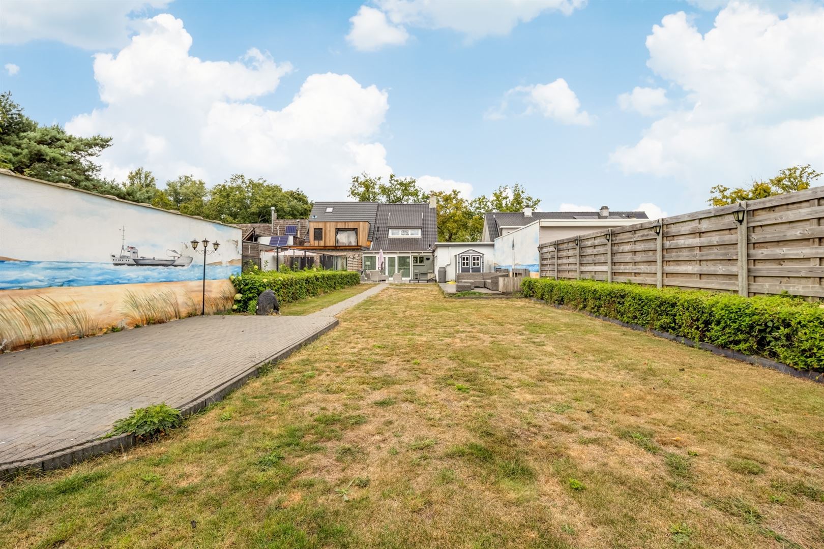 Instapklare halfopen woning met zonnige tuin aan de Vaart Schoten foto 23