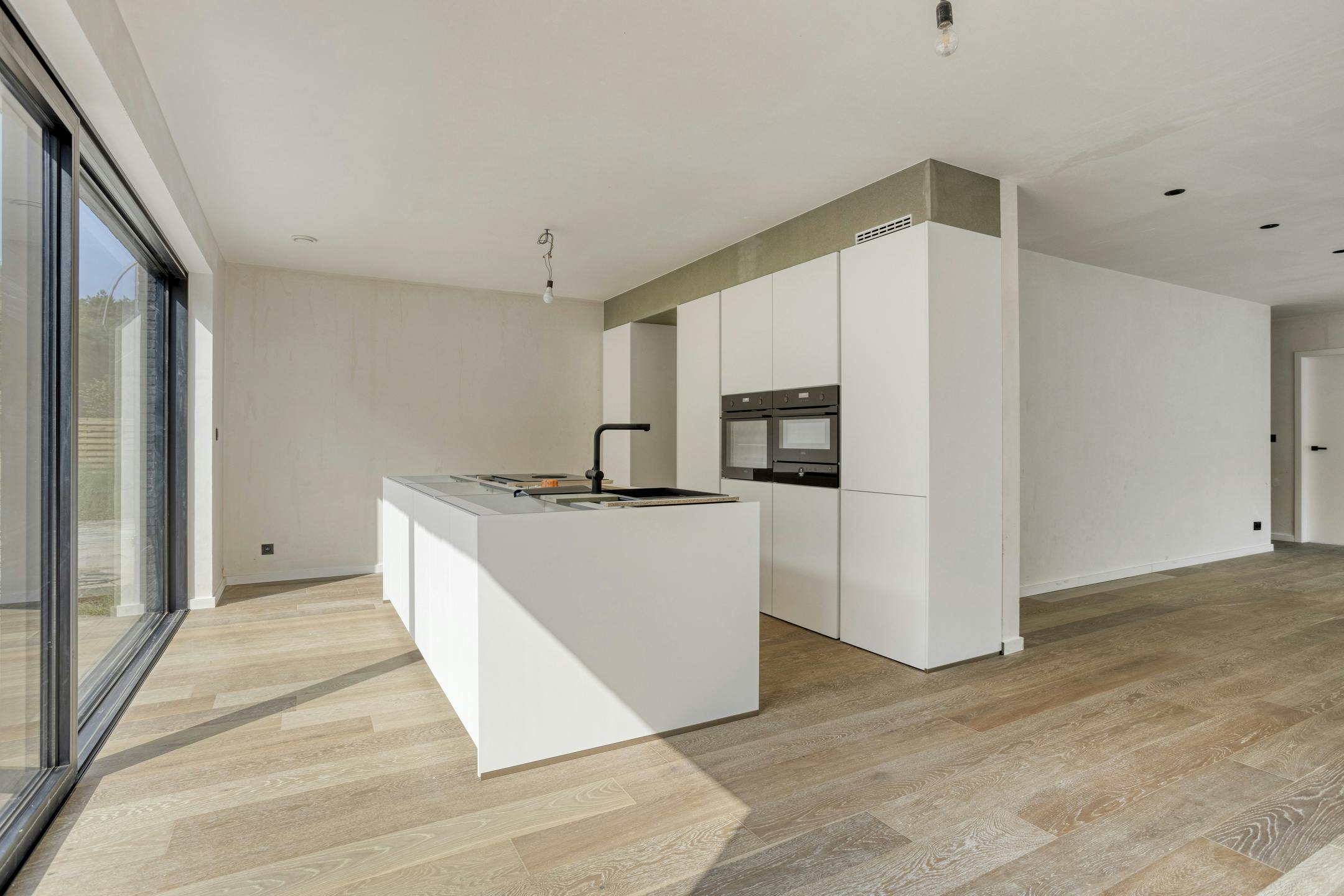 Halfopen-nieuwbouwwoning te koop nabij centrum Lichtaart foto 4