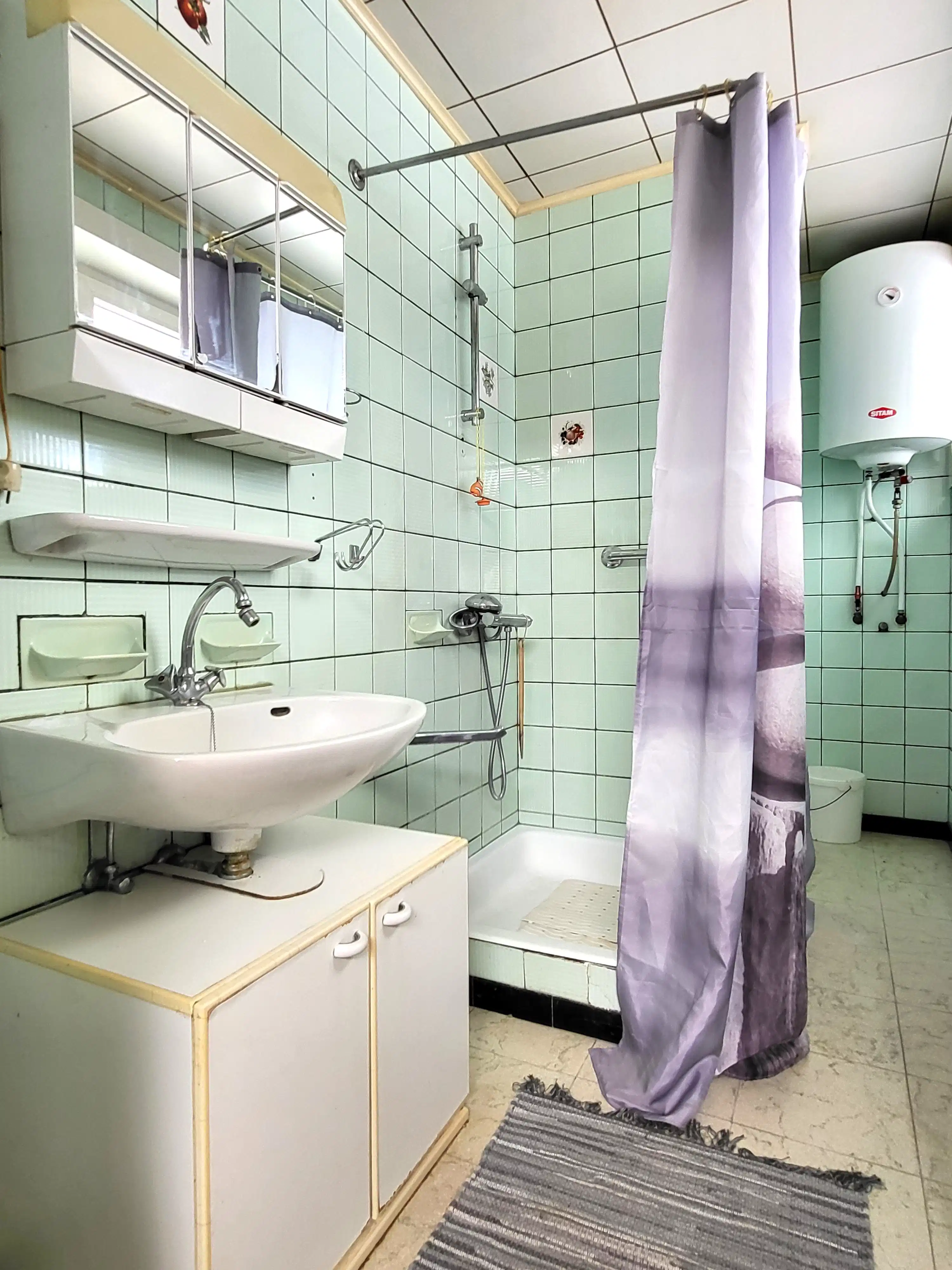 Deze charmante woning met karakter is gelegen op wandelafstand van het station en centrum, biedt een verrassend ruime en praktische indeling, ideaal voor starters of investeerders.  foto 11