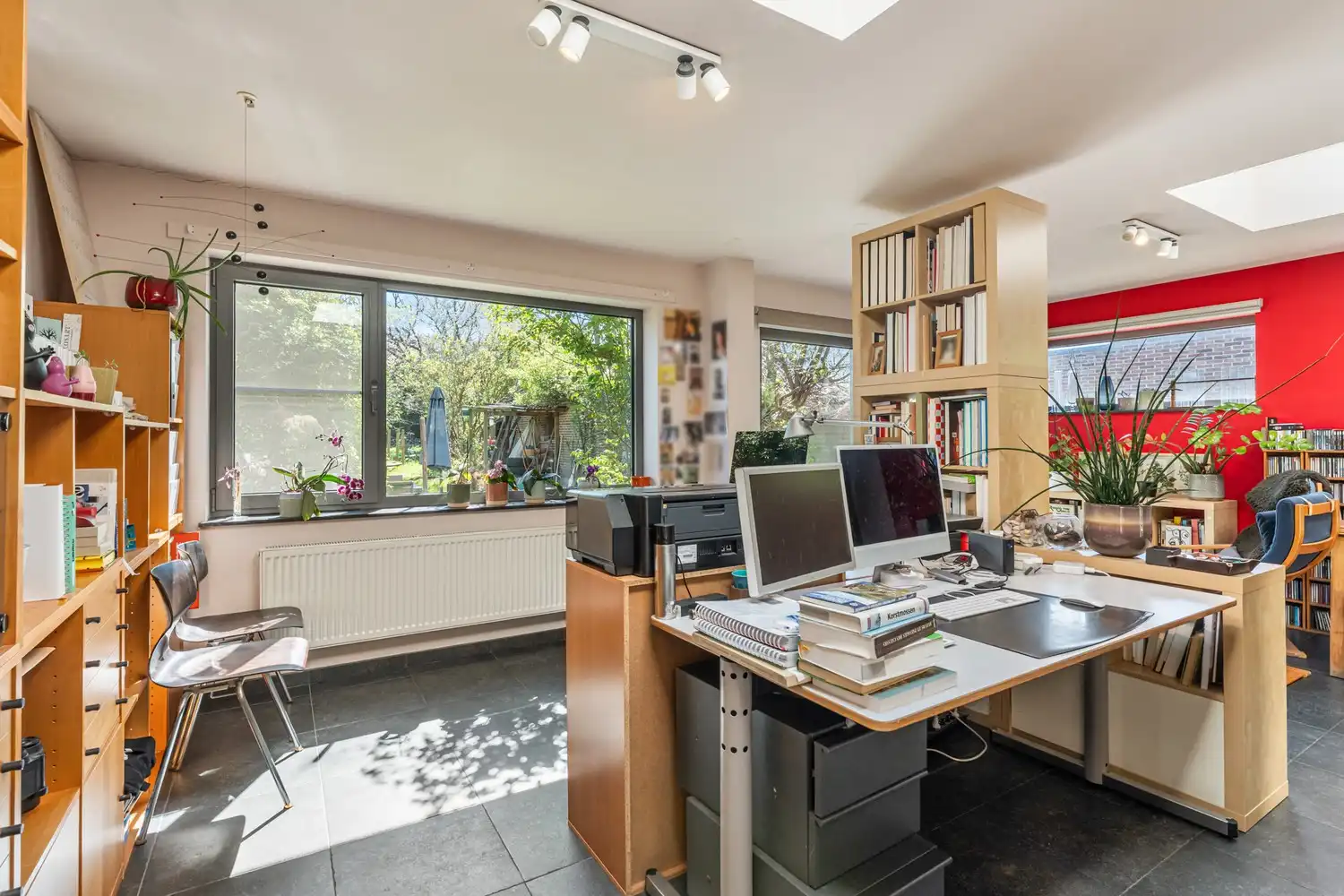 Goed gelegen en energiezuinige woning met 4 slaapkamers, een oprit met een garage en een tuin op de grens van Kessel-Lo en Holsbeek! foto 7