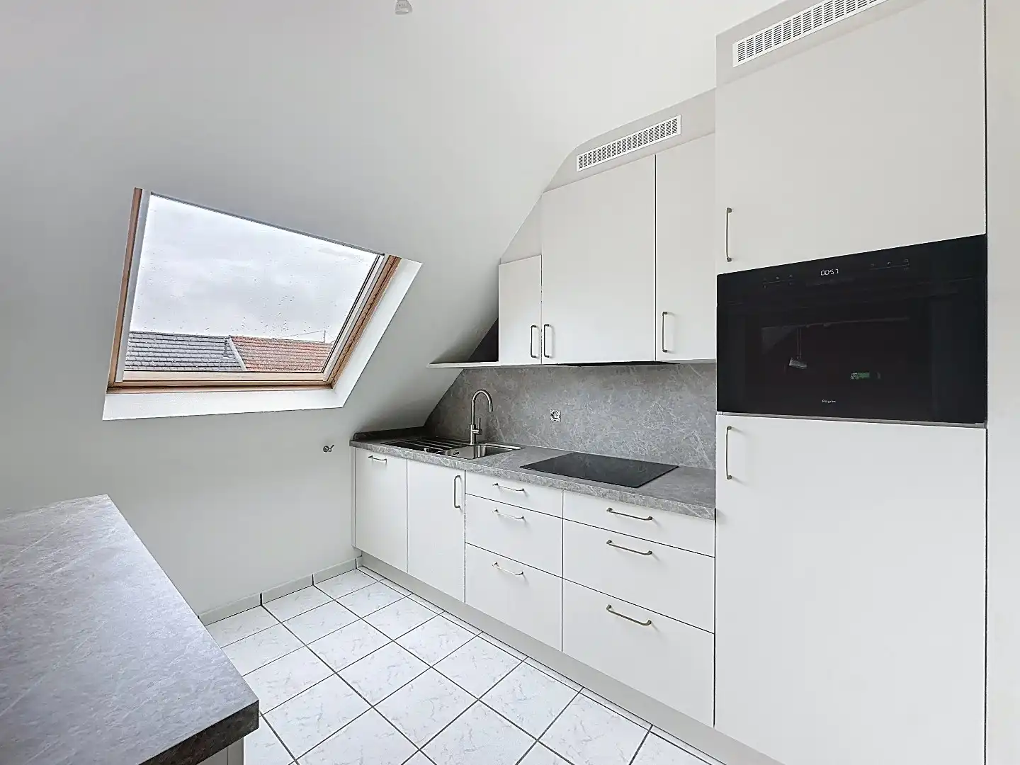 Ruim en lichtrijk appartement in het centrum van Wilsele! foto 4