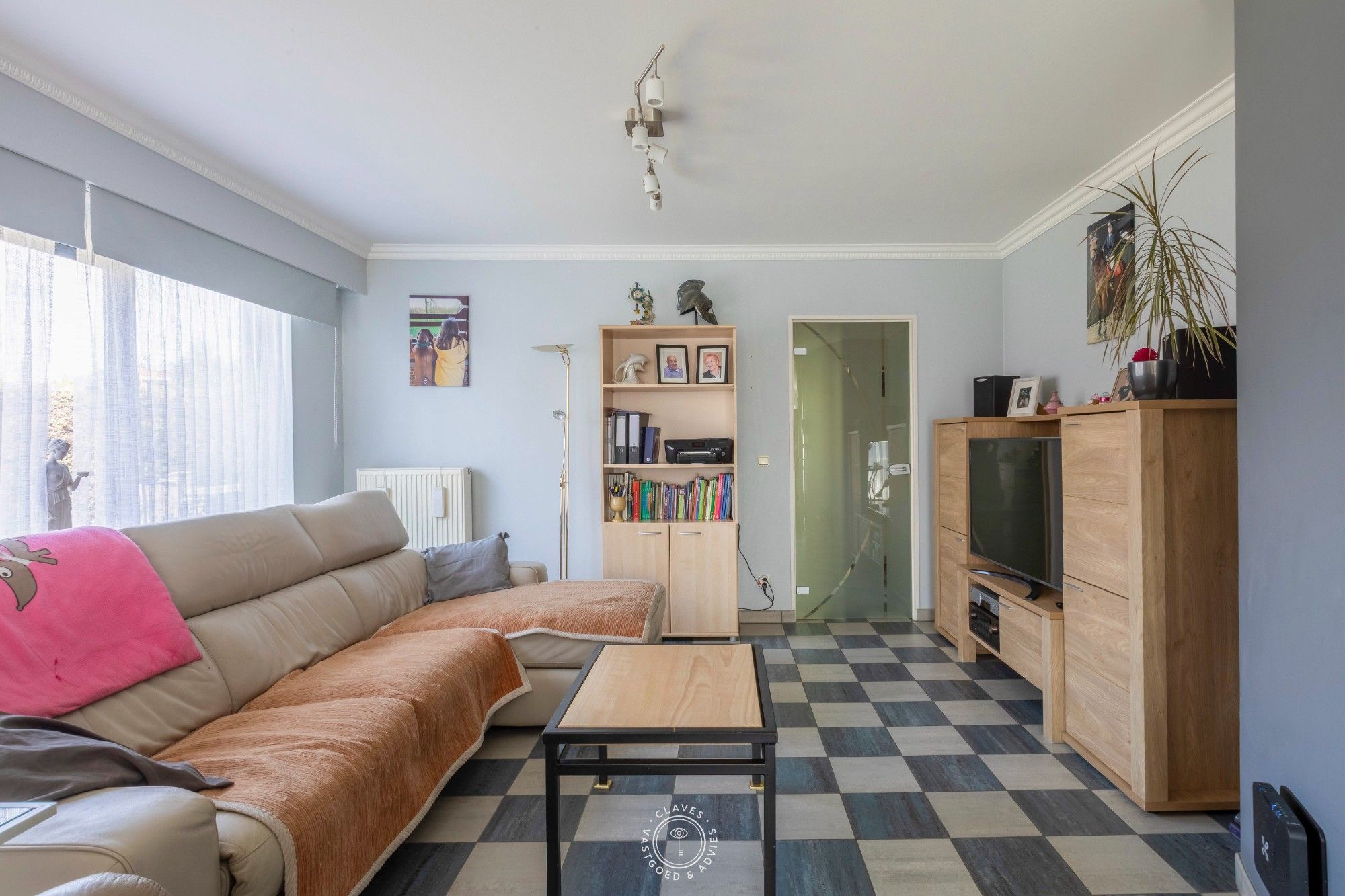 Ruim gelijkvloers appartement met tuin foto 8