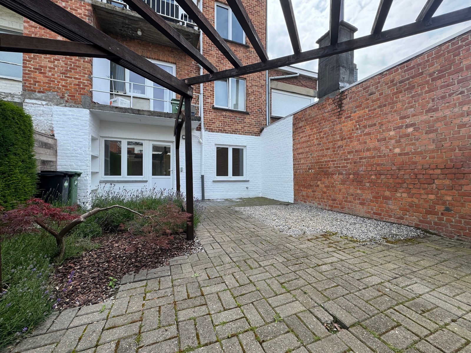 Te huur: gerenoveerd gelijkvloers appartement met tuintje foto 16