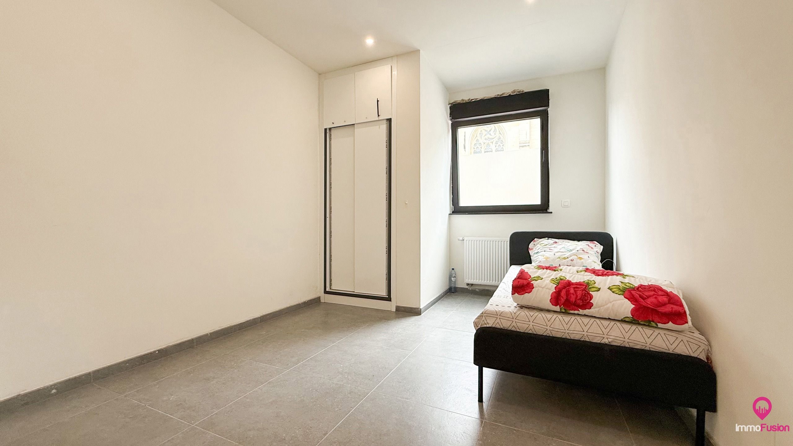 Gelijkvloers appartement met terras en kelder in hartje Zolder! foto 17