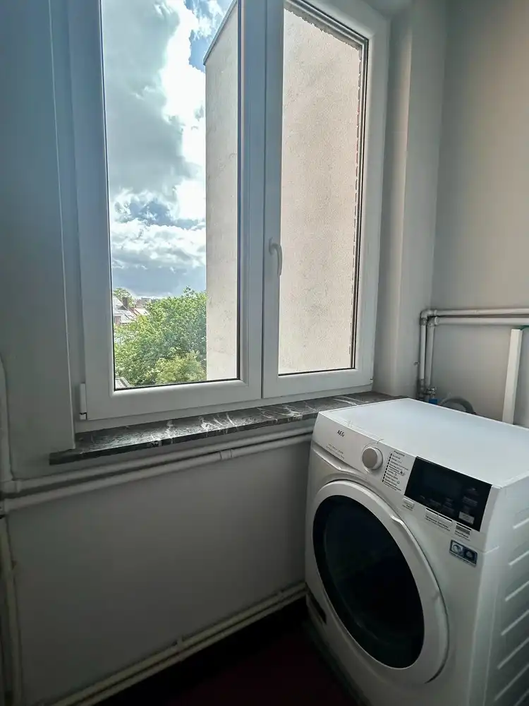 Gemeubeld, lichtrijk appartement op toplocatie te Leuven foto 12