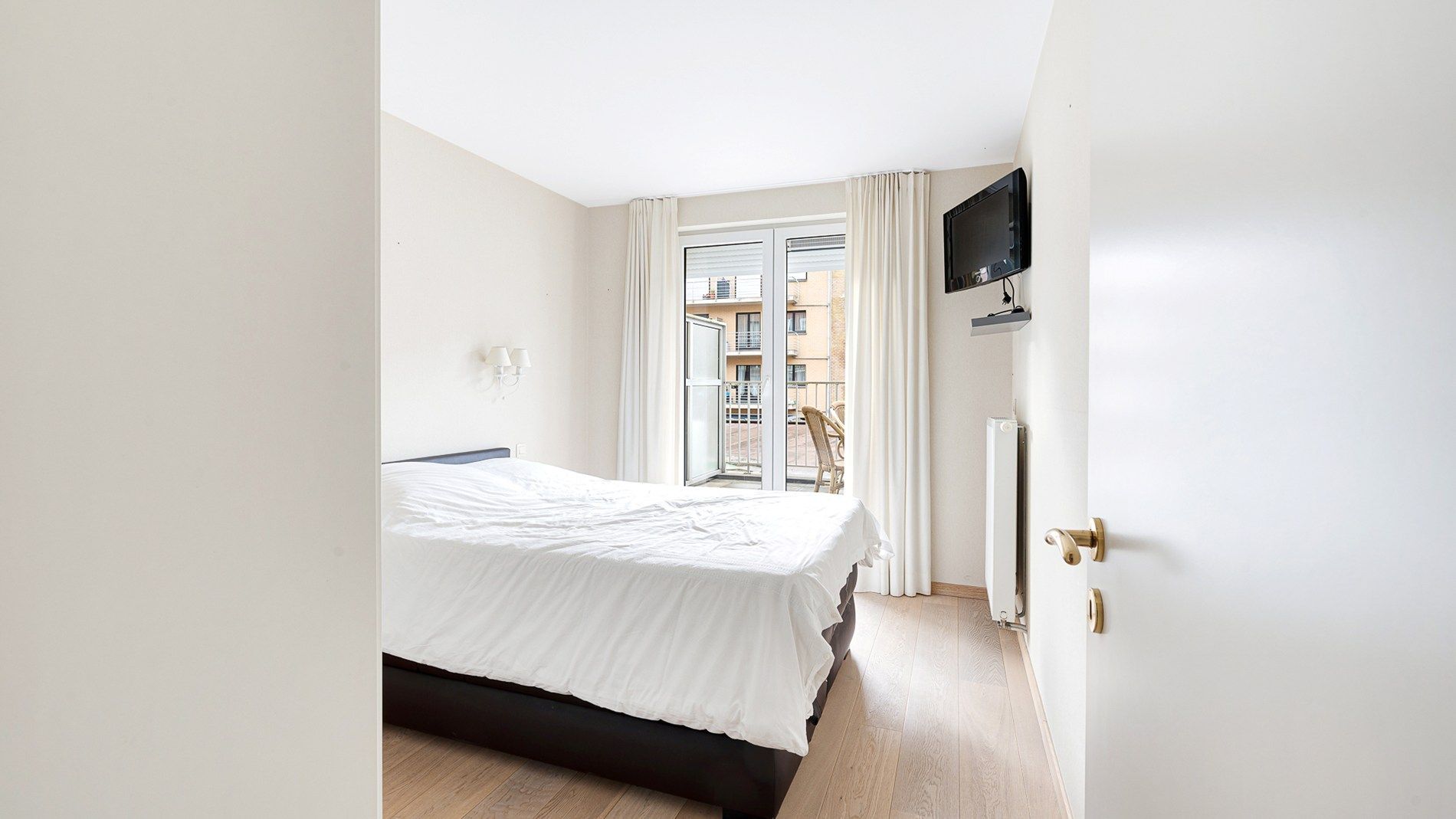 Ruim appartement (100m²) met zongericht terras foto 15