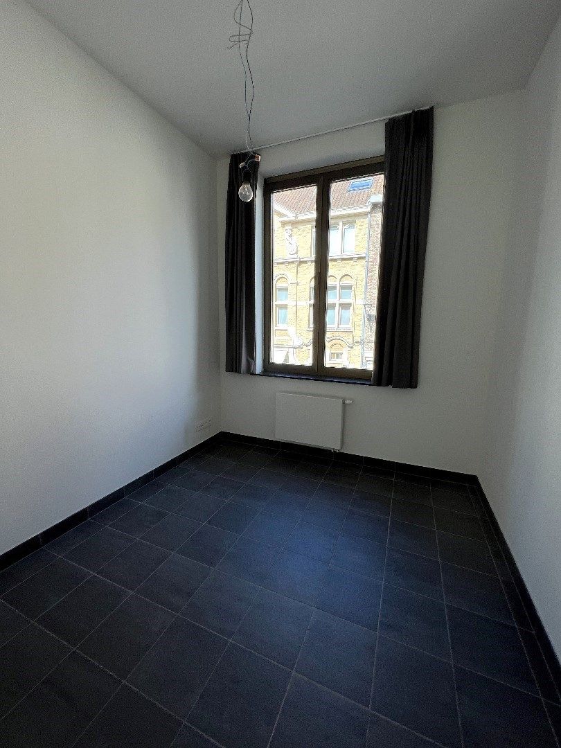 RUIM EN LICHTRIJK APPARTEMENT OP TOPLOCATIE IN CENTRUM IEPER foto 12