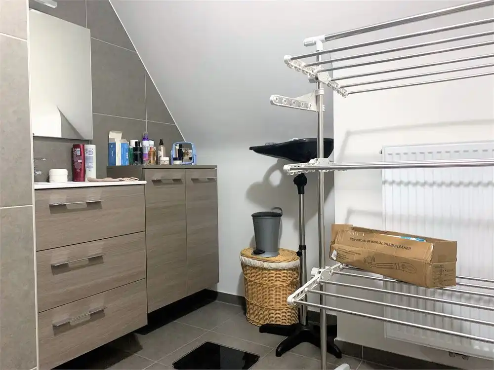 Instapklaar dakappartement met  2 slaapkamers + garage foto 9