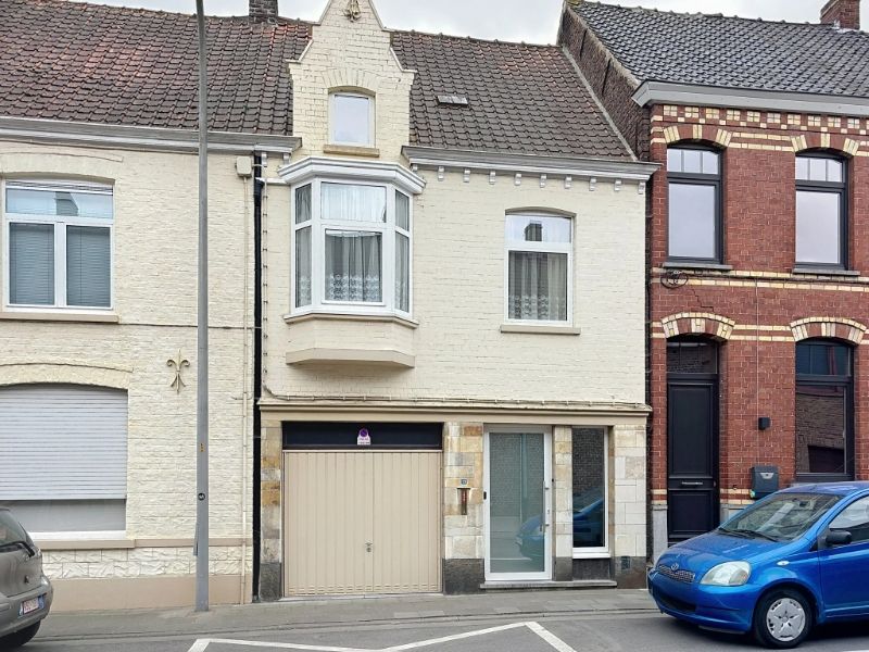 Knusse rijwoning foto {{pictureIndex}}