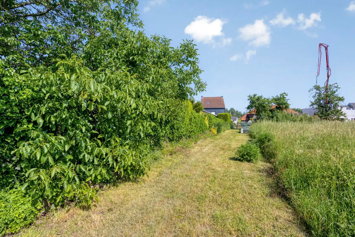 RUSTIG GELEGEN WONING MET ZORGWONING OP CA 15A TE BORGLOON. foto 42