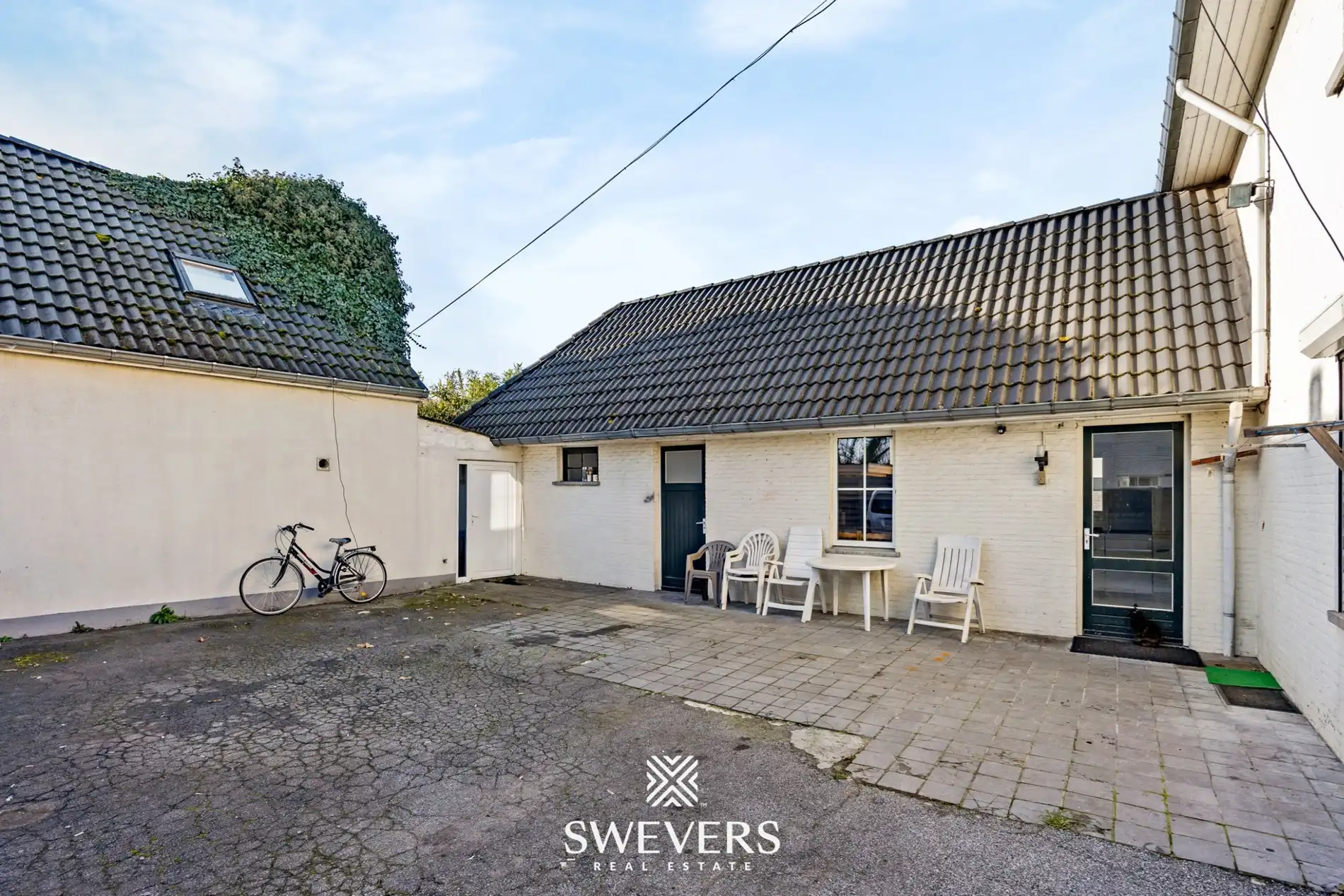Te renoveren open bebouwing met ruime volumes en zuidgericht perceel in Heusden   foto 31