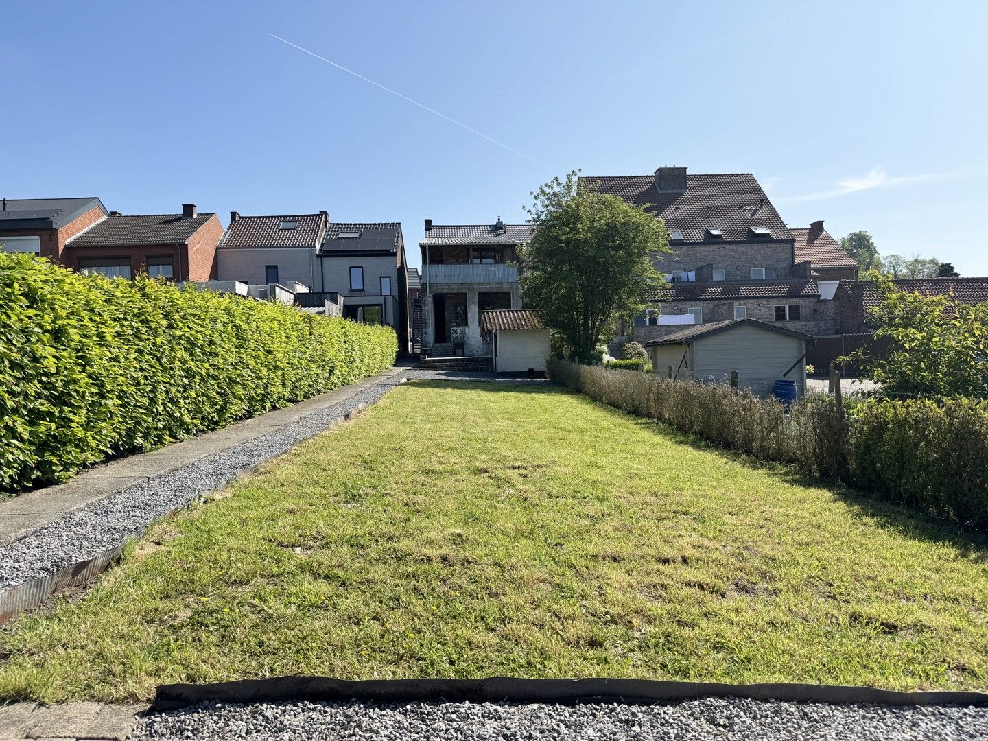 Opbrengsteigendom met potentieel in hartje Borgloon – Tweewoonst met tuin en terras foto 13