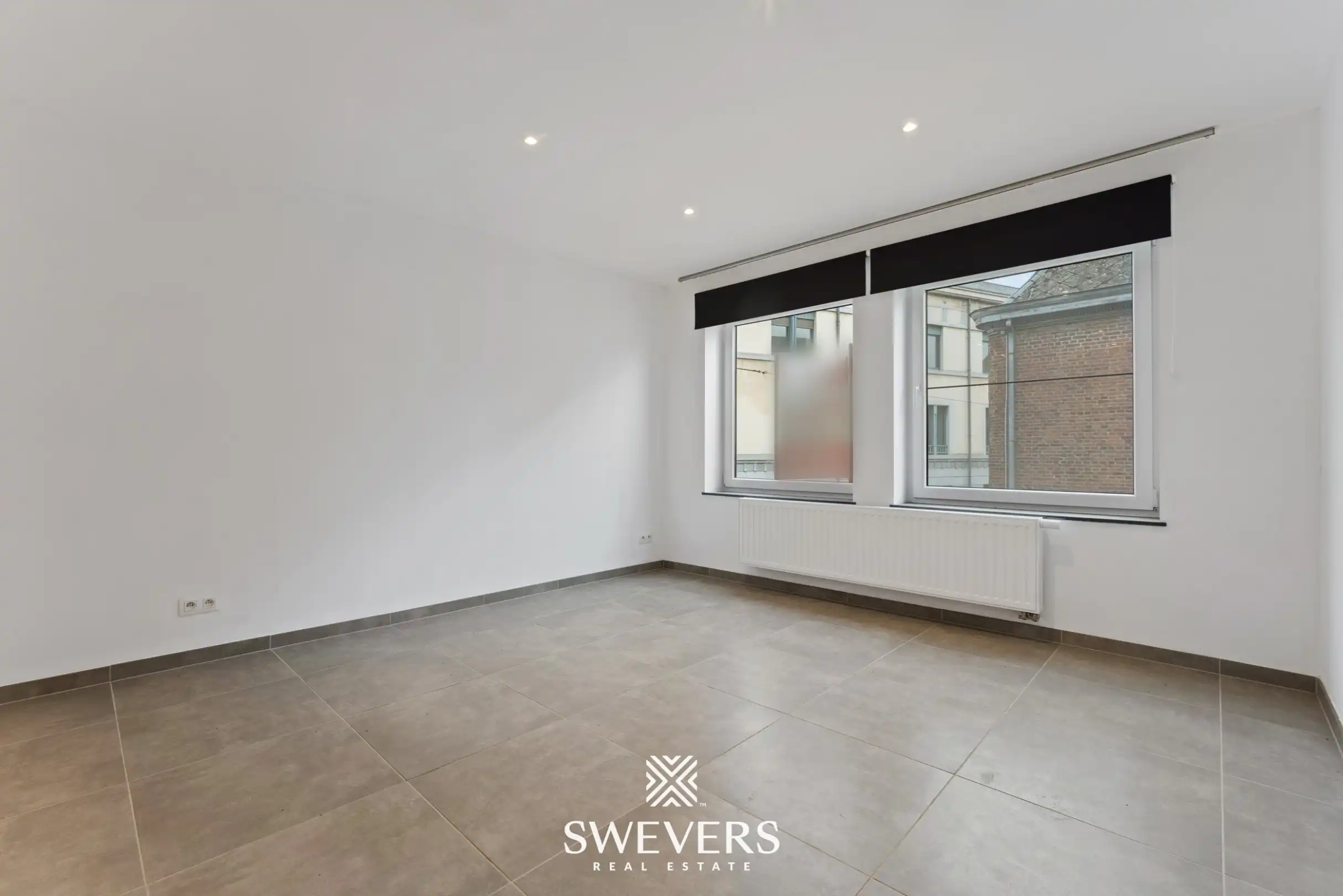 Instapklaar 2-slaapkamer appartement met autostaanplaats in hartje Tongeren   foto 5