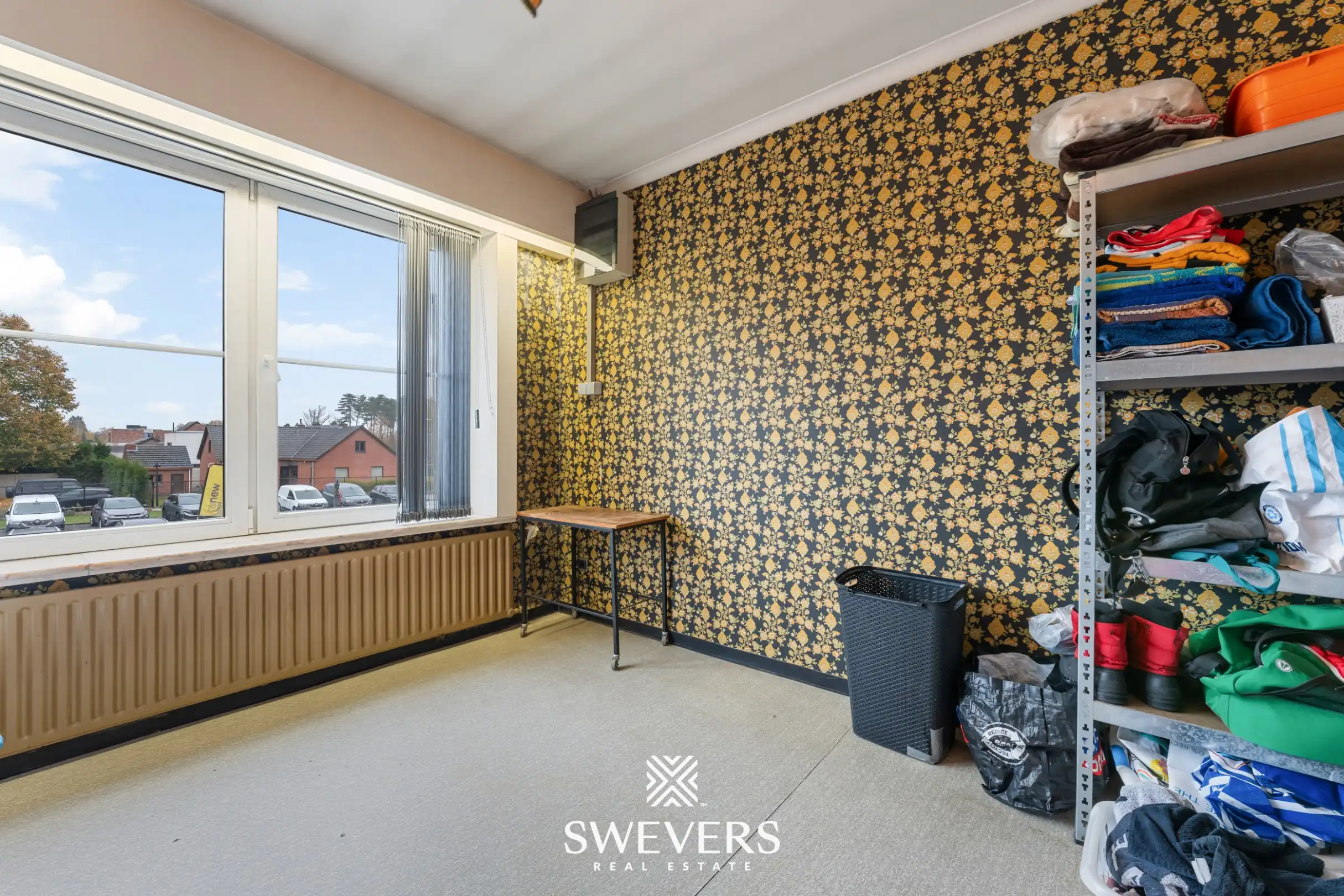 Opbrengsteigendom met handelspand, ruim appartement en uitbreidingspotentieel in hartje Heusden-Zolder foto 27