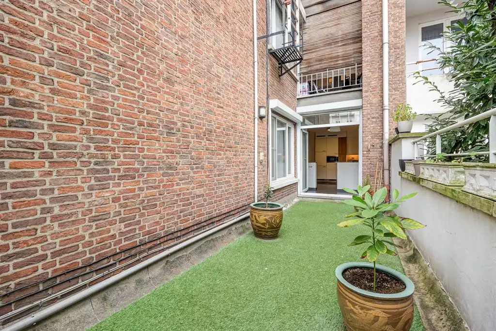 Ruim appartement met terras en zicht op Stadspark foto 8