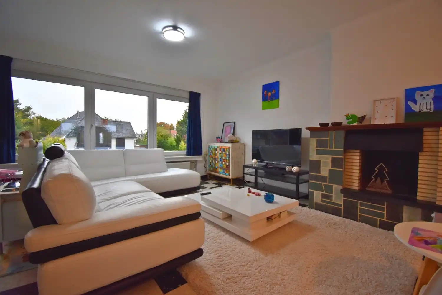 ruime bel-étagewoning met 3 slaapkamers, garage en tuin in het centrum van Sint-Pieters-Leeuw foto 4