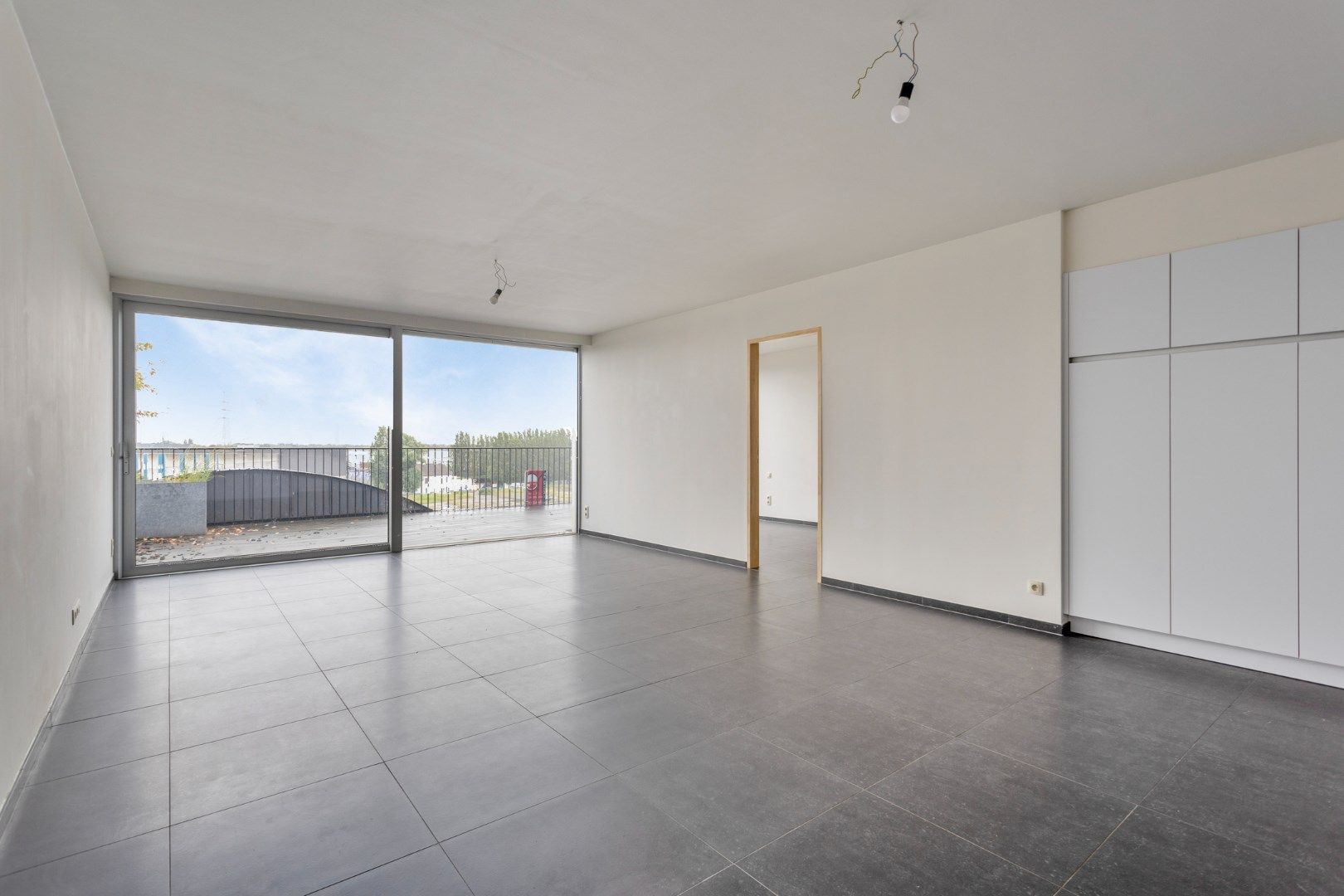 Éénslaapkamer appartement, terras (31m²) en zicht op de Dokken foto 7