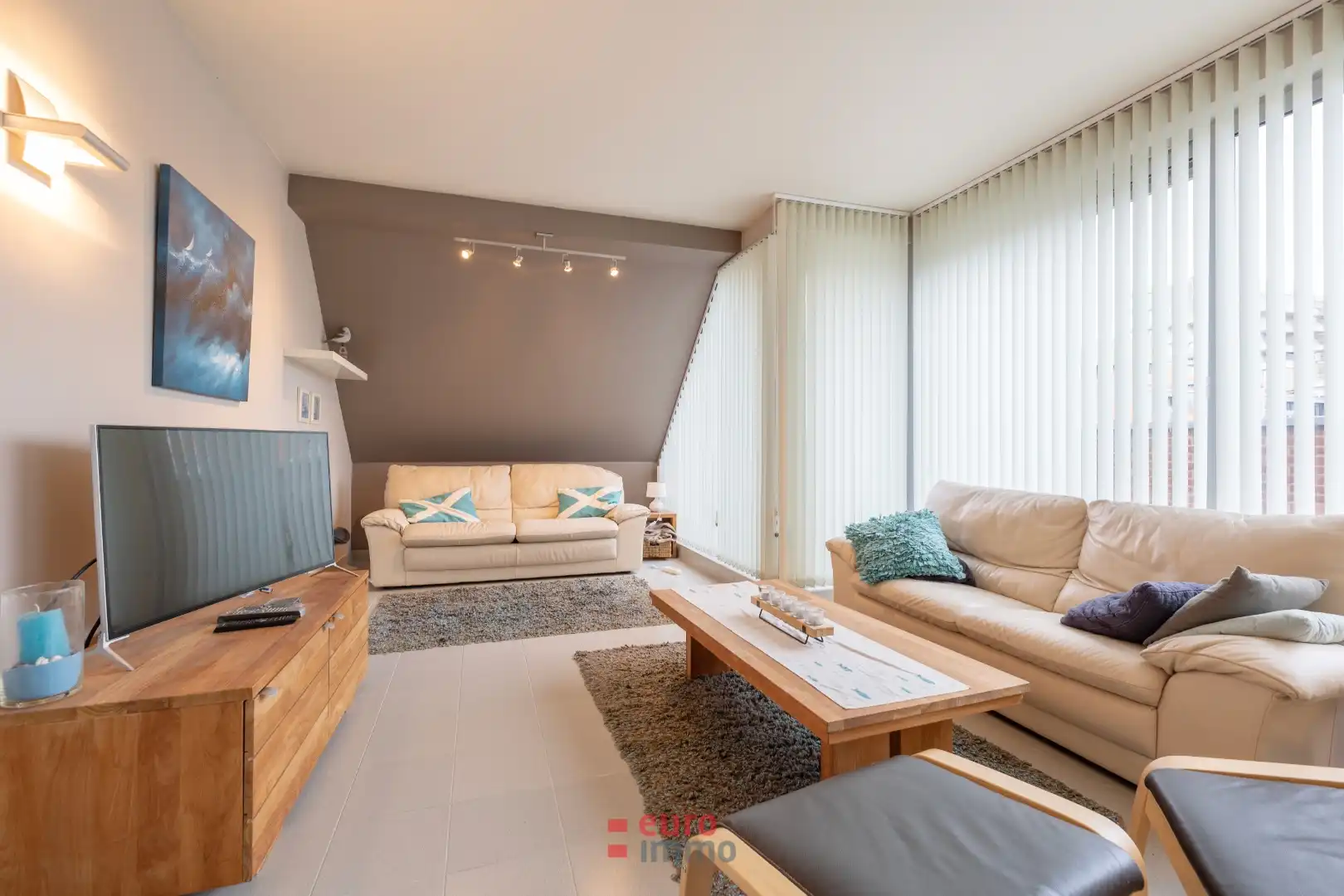 Uitermate lichtrijke penthouse midden in de winkelstraat! foto 5