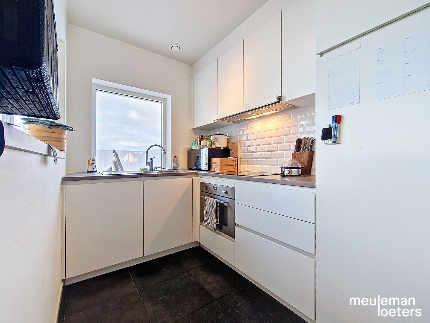 Kwalitatief afgewerkt appartement met parkeerplaats foto 7