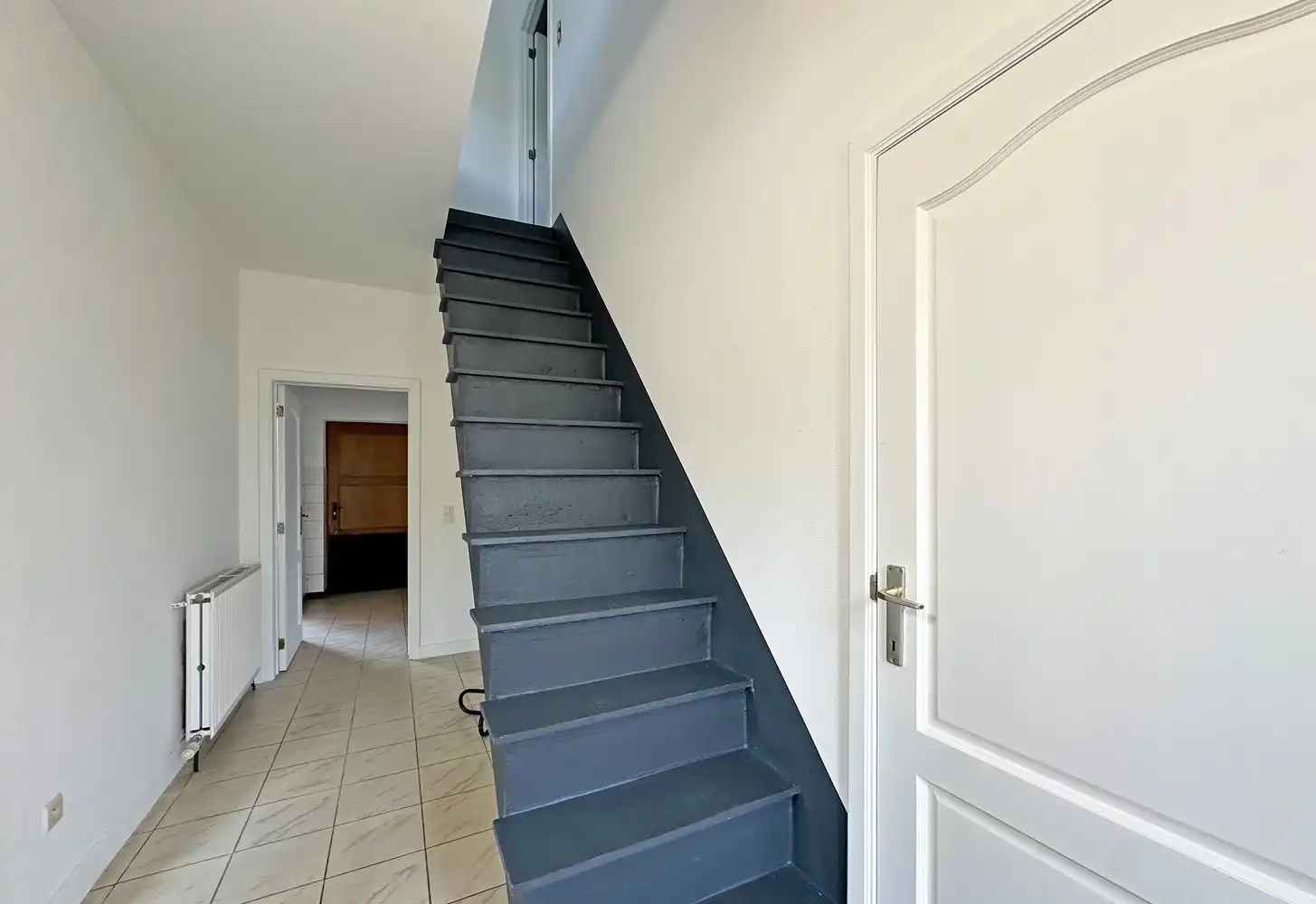 Zeer ruime woning met 4 slaapkamers, groot terras en 2 autostaanplaatsen! foto 4