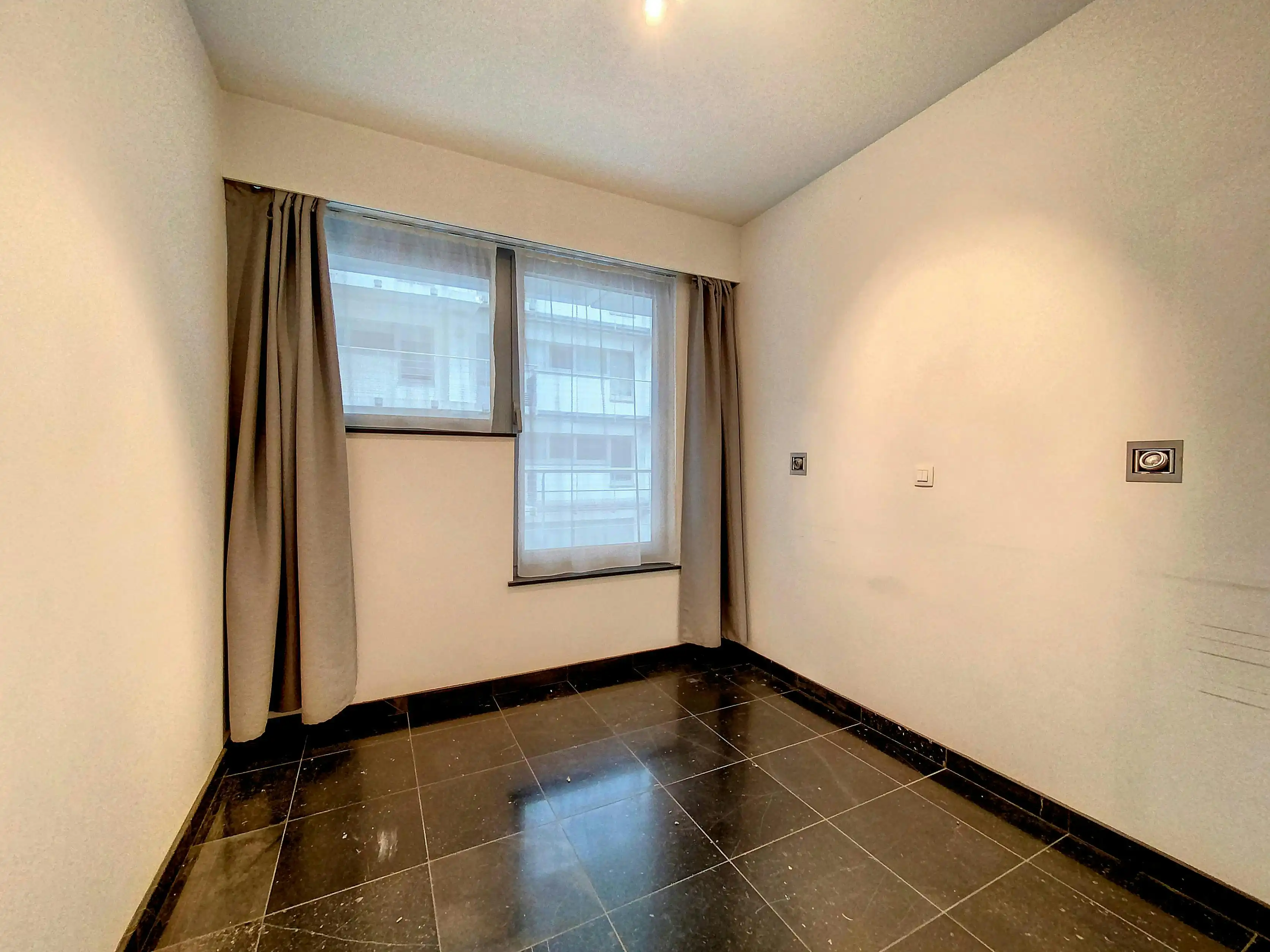 Loft nabij Zuidstation Sint-Gillis met 2 slaaphoeken/-kamers foto 9