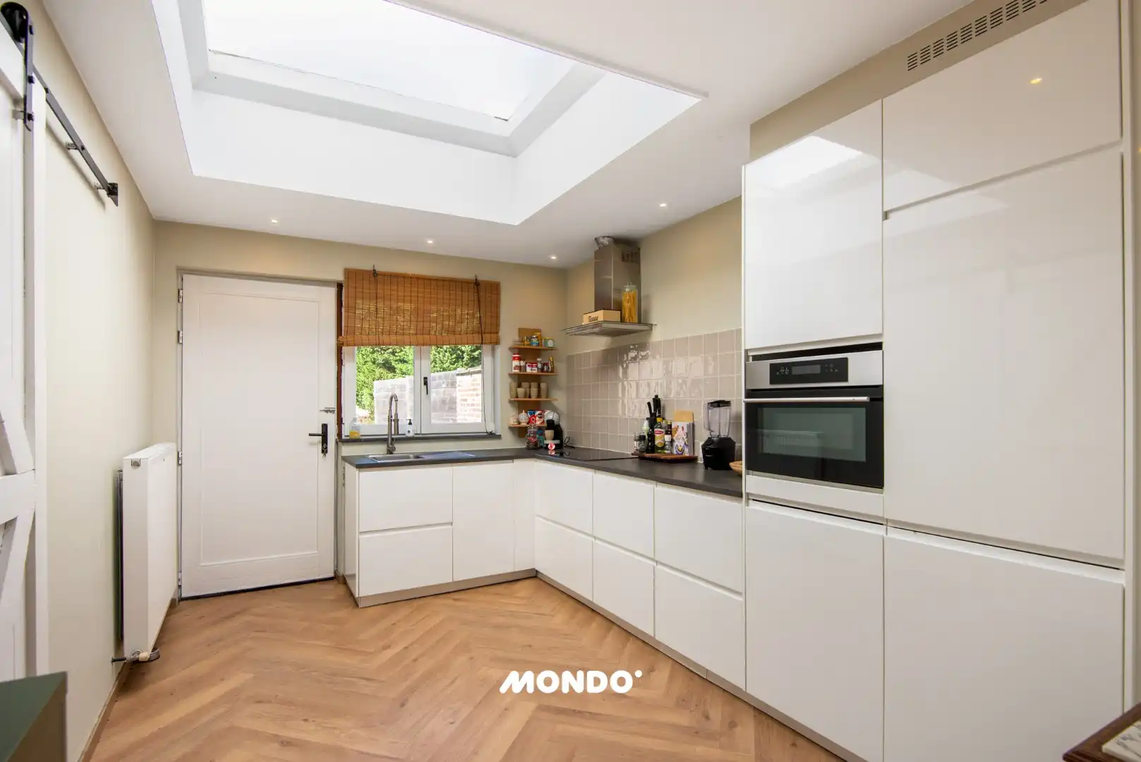 Instapklare halfopen woning met zonnige westgerichte tuin! foto 7