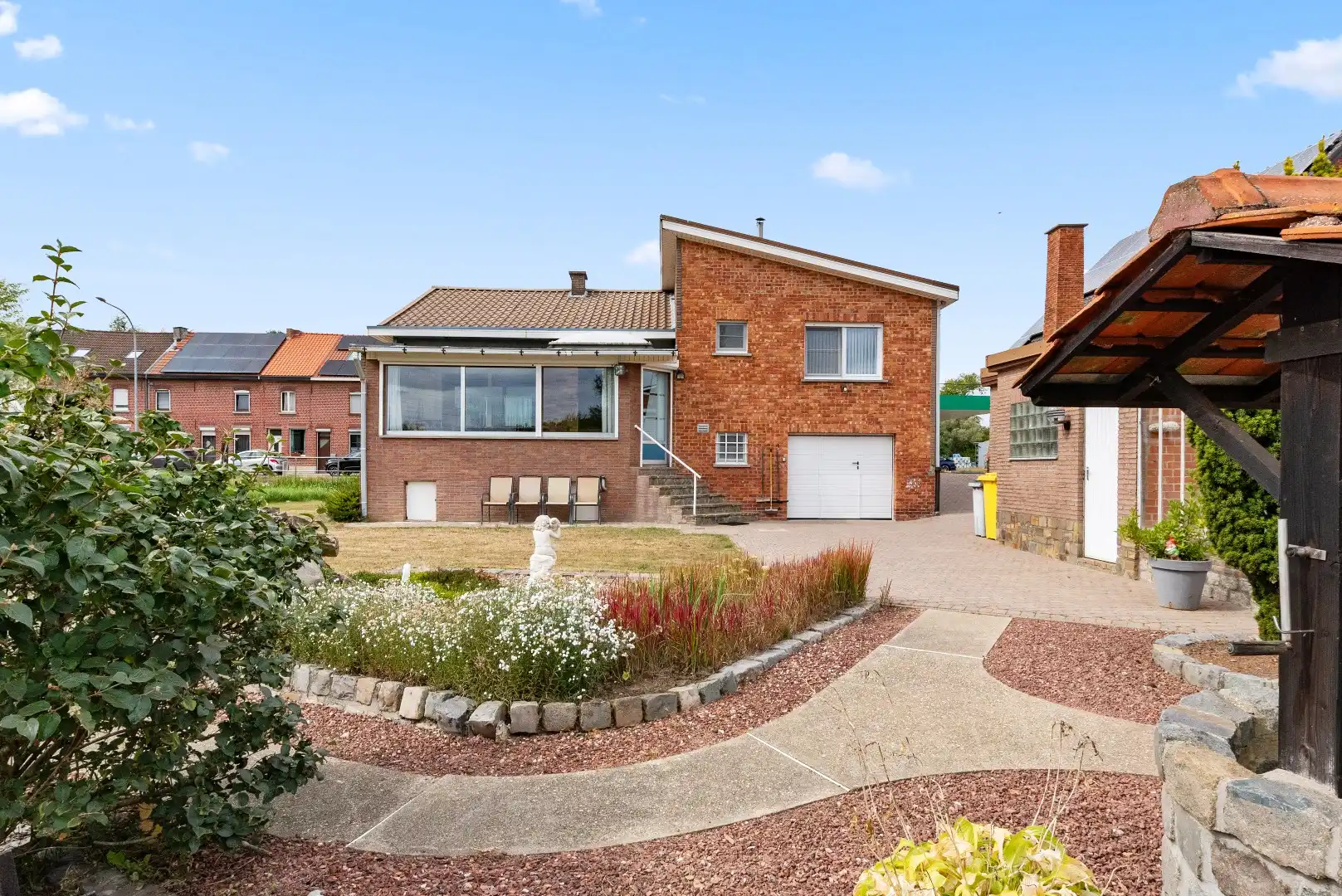 Open bebouwing op topligging met 3 slaapkamers en prachtige tuin foto 26