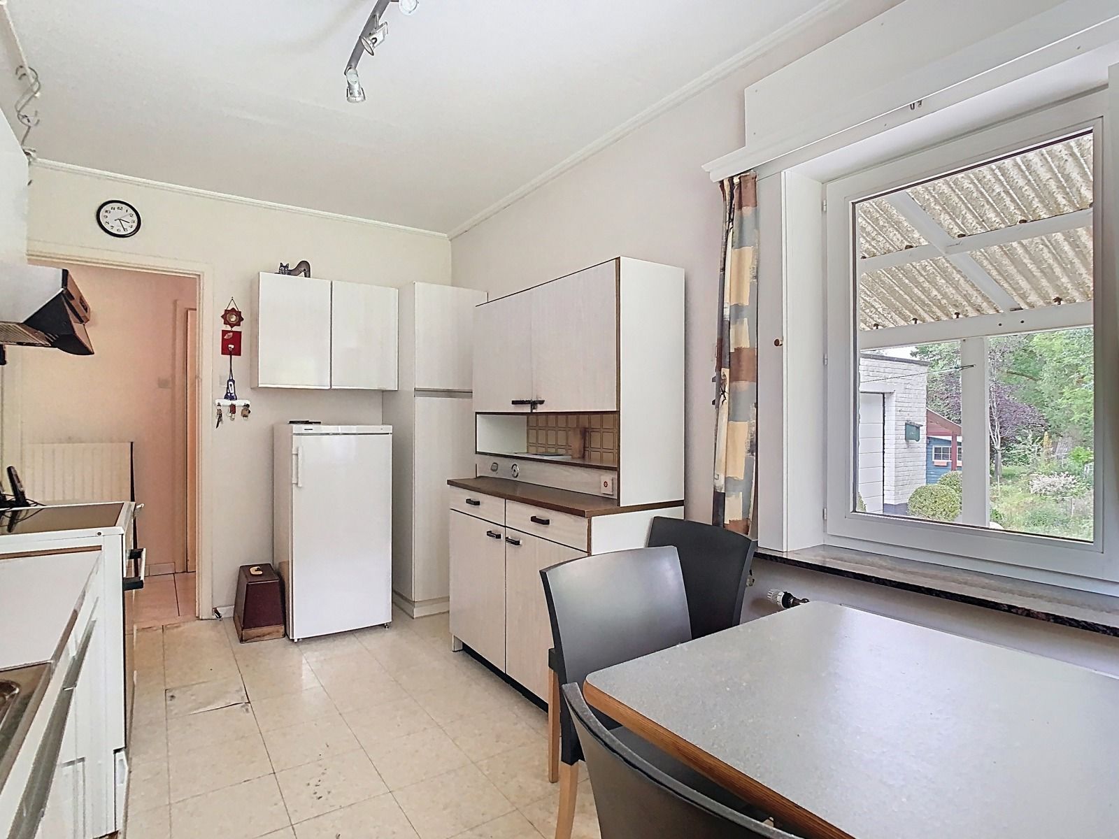 Woning met 2 SLPK, garages en riante tuin, op Toplocatie! foto 7