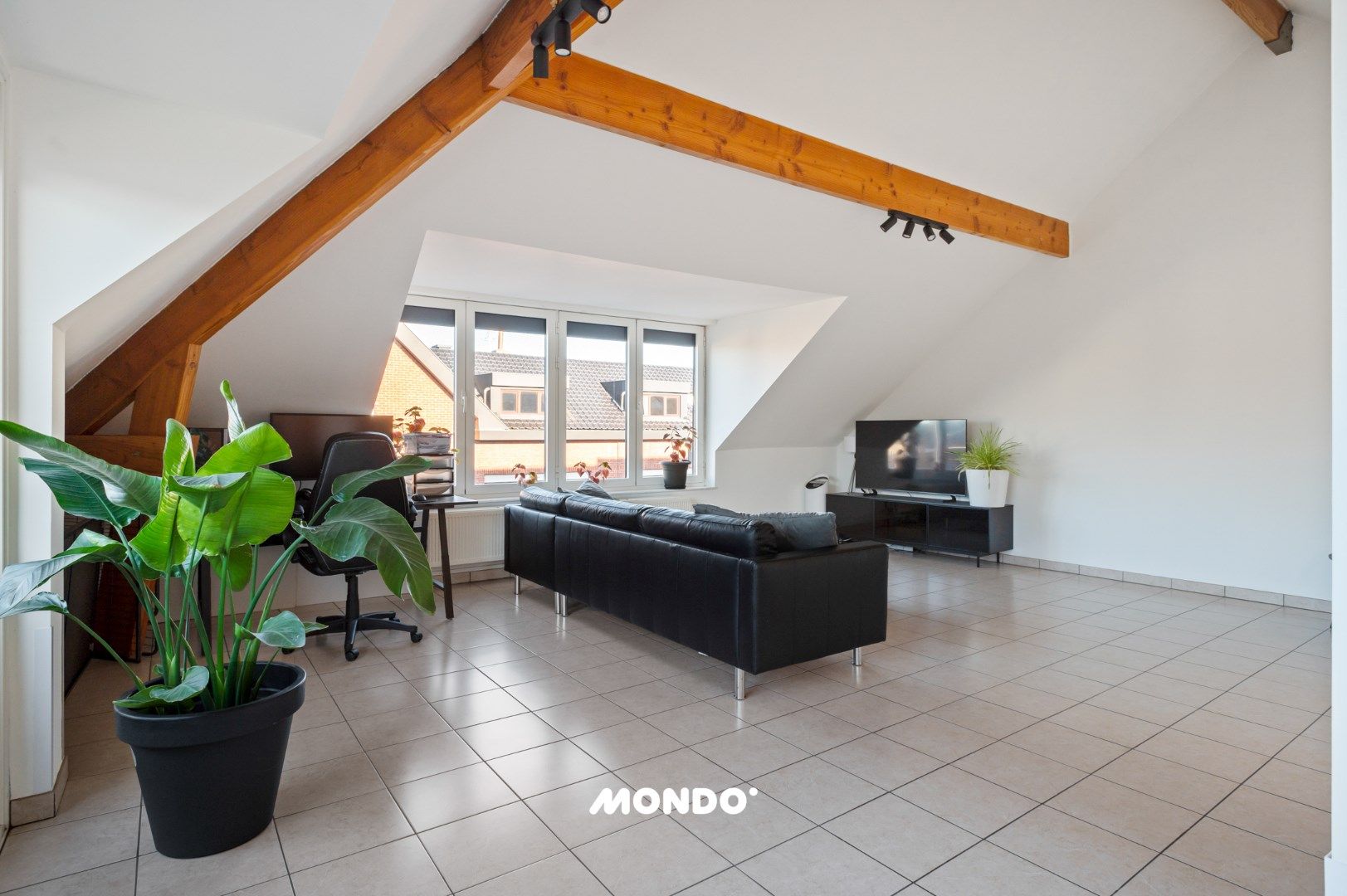Instapklaar dakappartement met terras in Niel, 1 slaapkamer, bouwjaar 2007, EPC label C, centraal gelegen foto 2