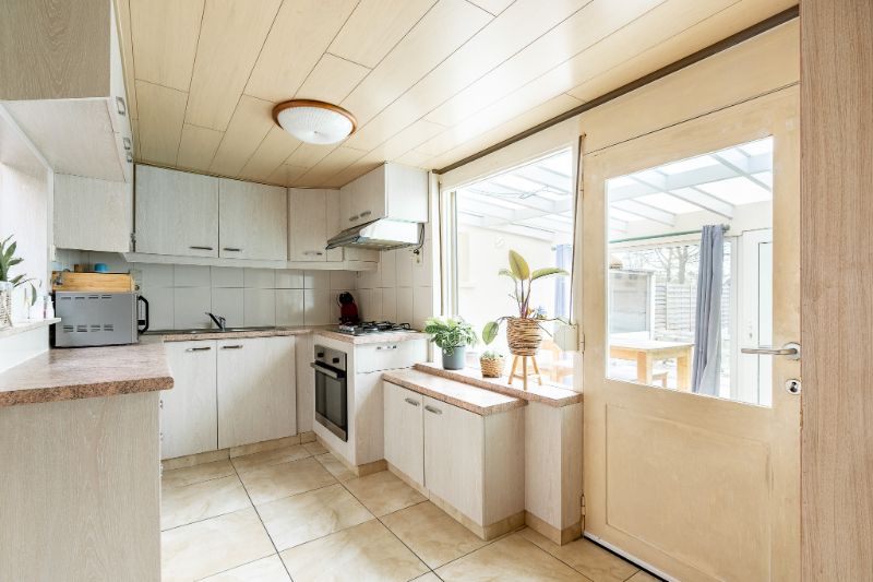 Halfopen woning met 3 slpks en garage foto 8