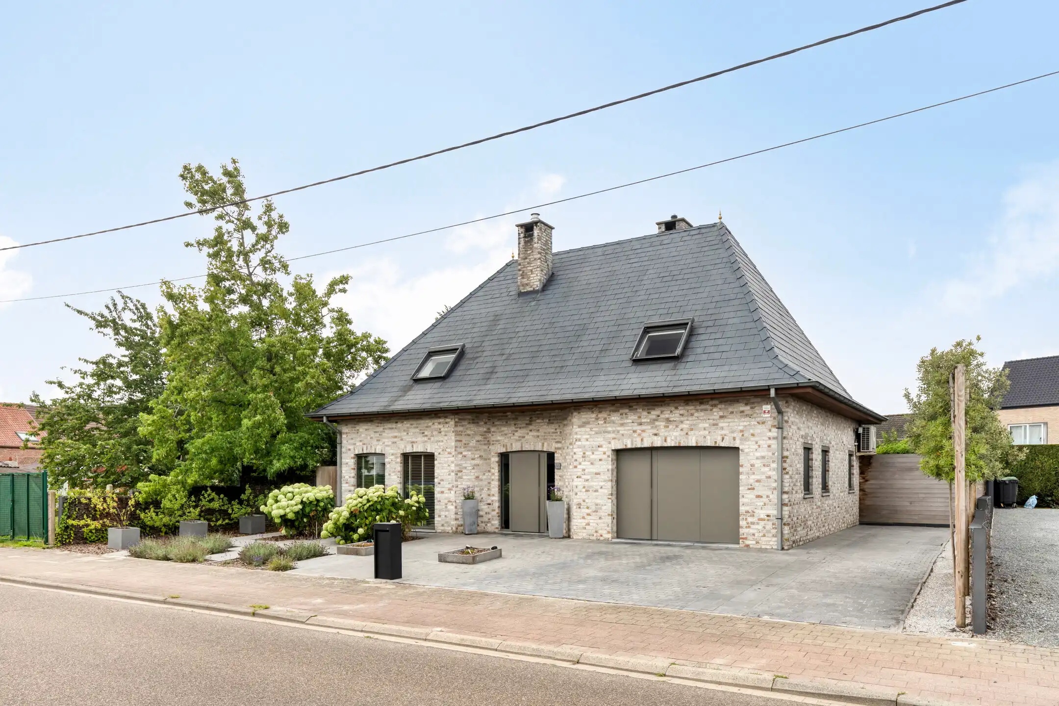Stijlvolle villa met zwembad in Zemst foto {{pictureIndex}}