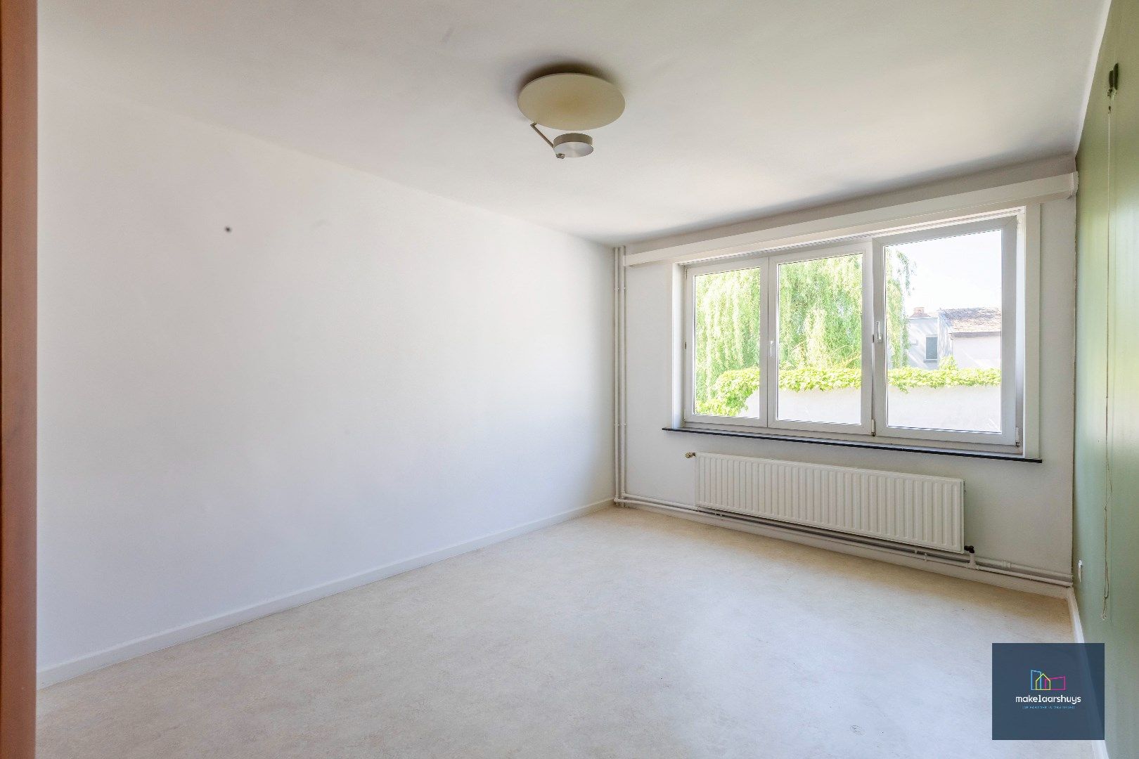 Centraal gelegen halfopen bebouwing met stadskoer foto 17
