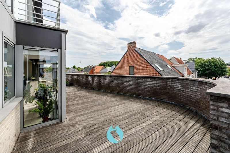 Dit prachtig en ruim appartement met één van de mooiste terrassen te Evergem is gelegen in de Kapellestraat foto 3