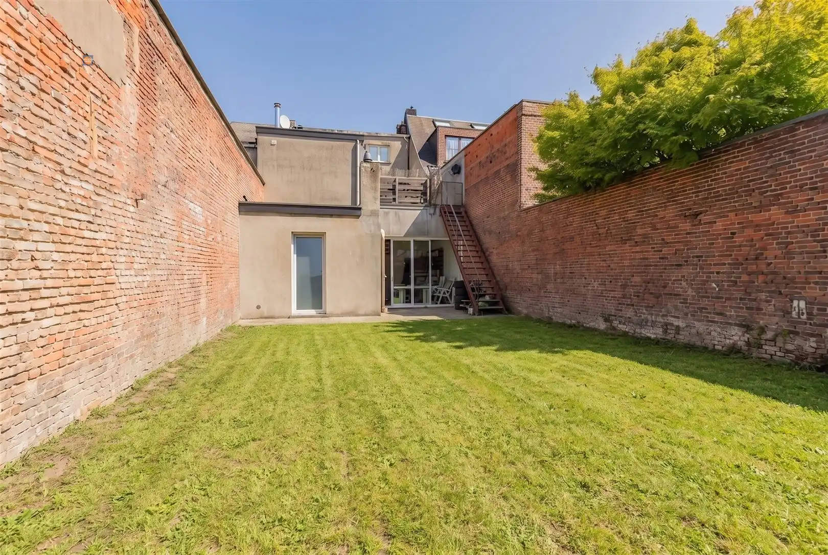 Opbrengsteigendom met handelsruimte en verhuurd duplex appartement in het centrum van Willebroek foto 32