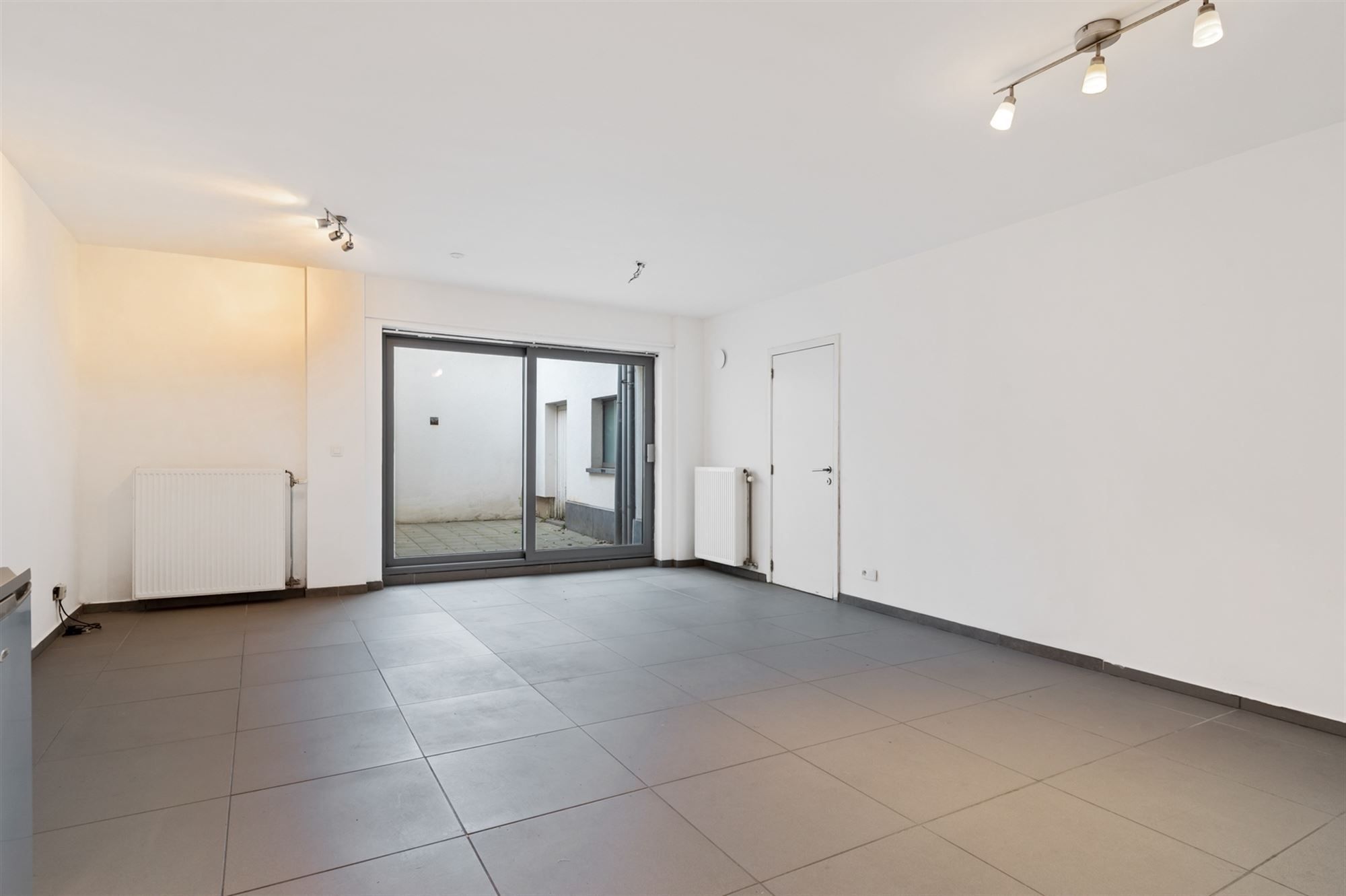 Gelijkvloers appartement met ruim terras foto 3