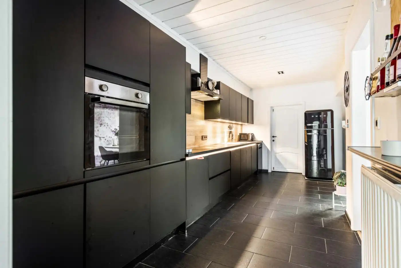 Top gelegen, gerenoveerde woning met 4 à 5 slpk. en zuid-tuin foto 9