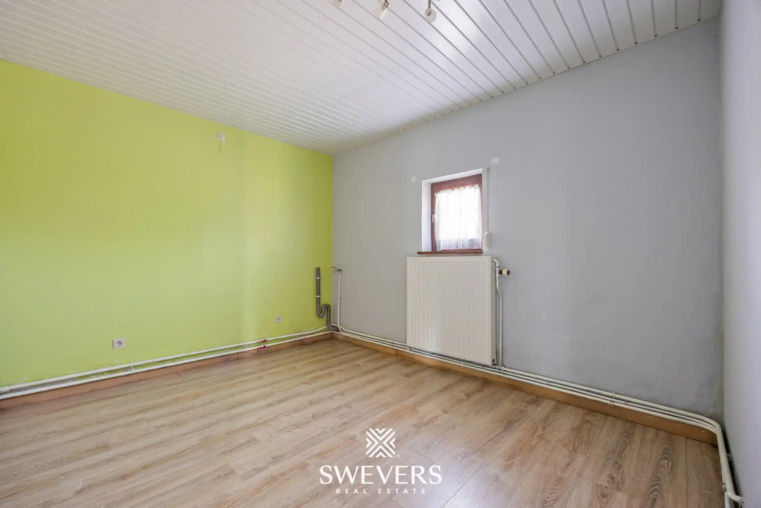 Vrijstaande woning met groot perceel en enorm renovatiepotentieel in Herk-de-Stad foto 23